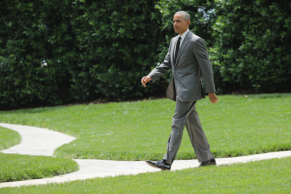 U.S. President Barack Obama walks across the South Lawn before boarding Marine One and departing the White House June 3, 2016 in Washington, DC.