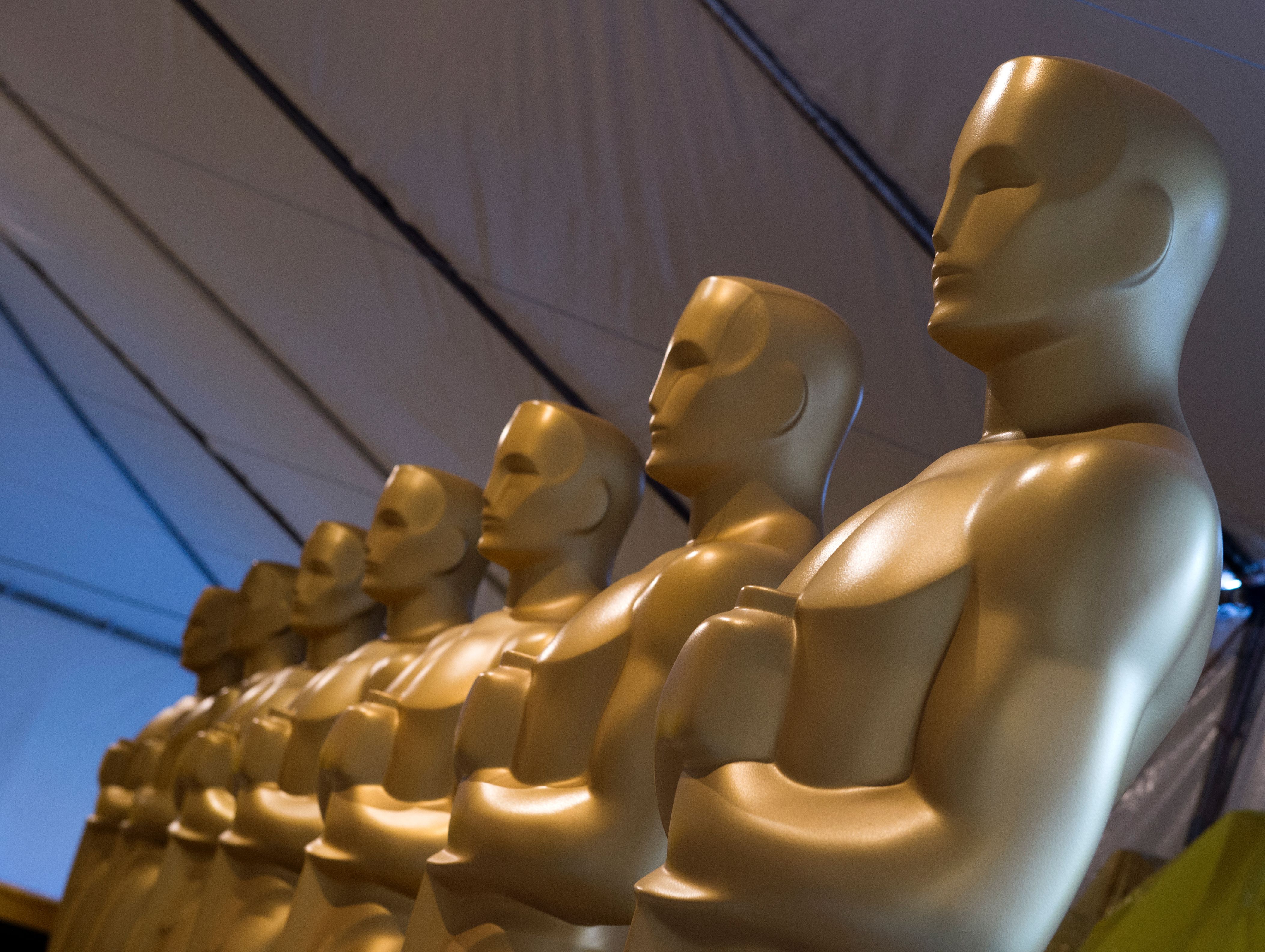 Oscar statuettes are seen as workers make preparations for the 88th Annual Academy Awards, Hollywood, California, on February 24, 2016.