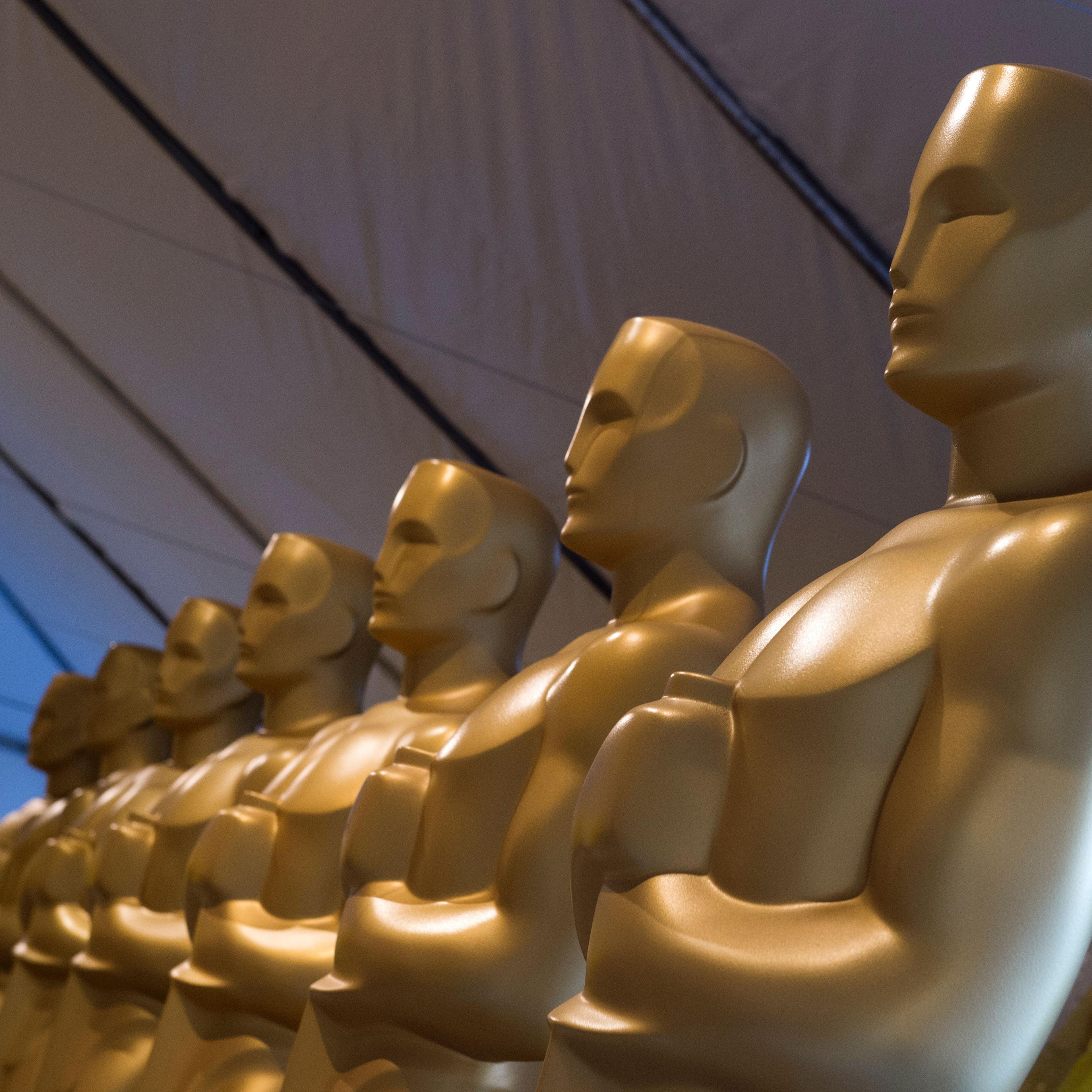 Oscar statuettes are seen as workers make preparations for the 88th Annual Academy Awards, Hollywood, California, on February 24, 2016.