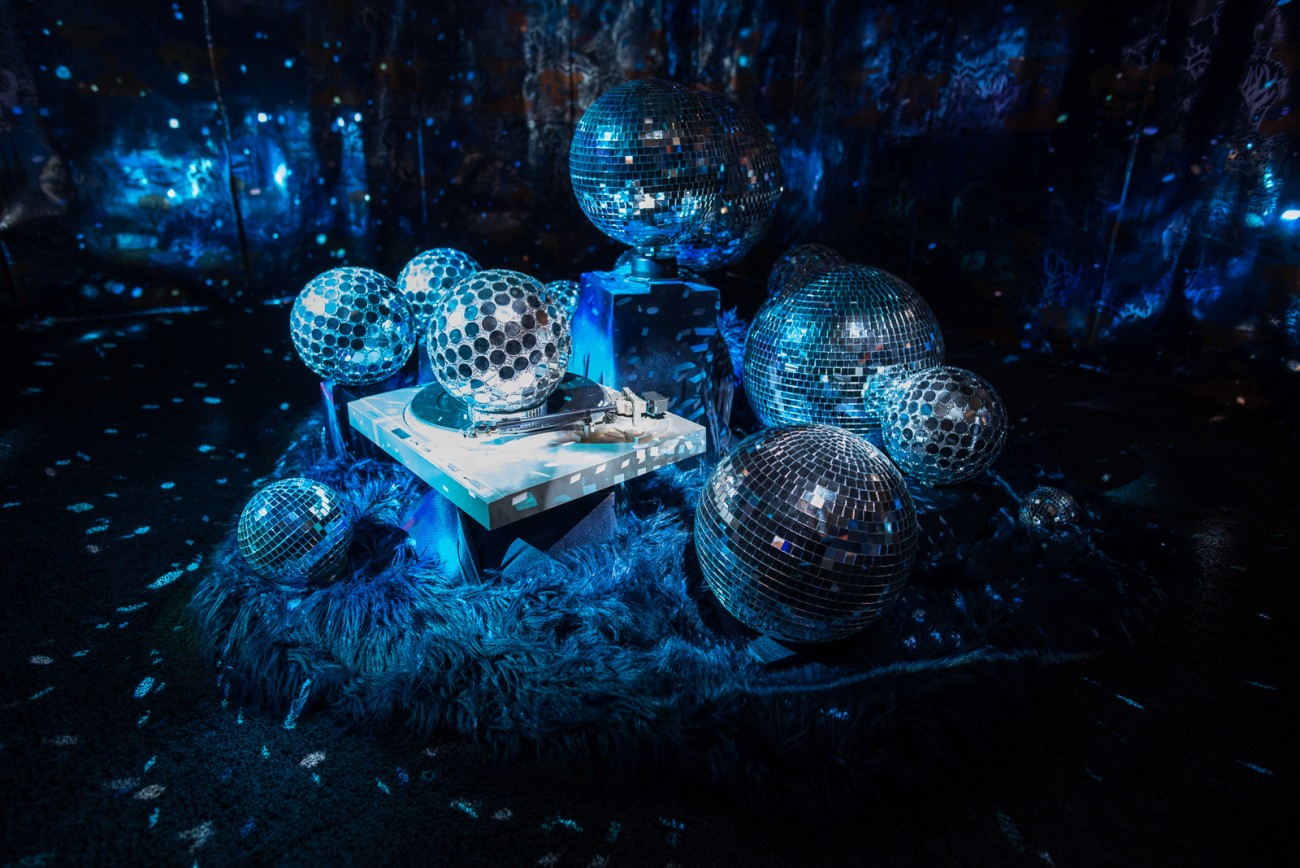 Cauleen Smith, Space Station: Two Rebeccas, 2018. Wallpaper, disco balls, turntable, motor, fur, shag carpet, two projectors, digital video. LACMA