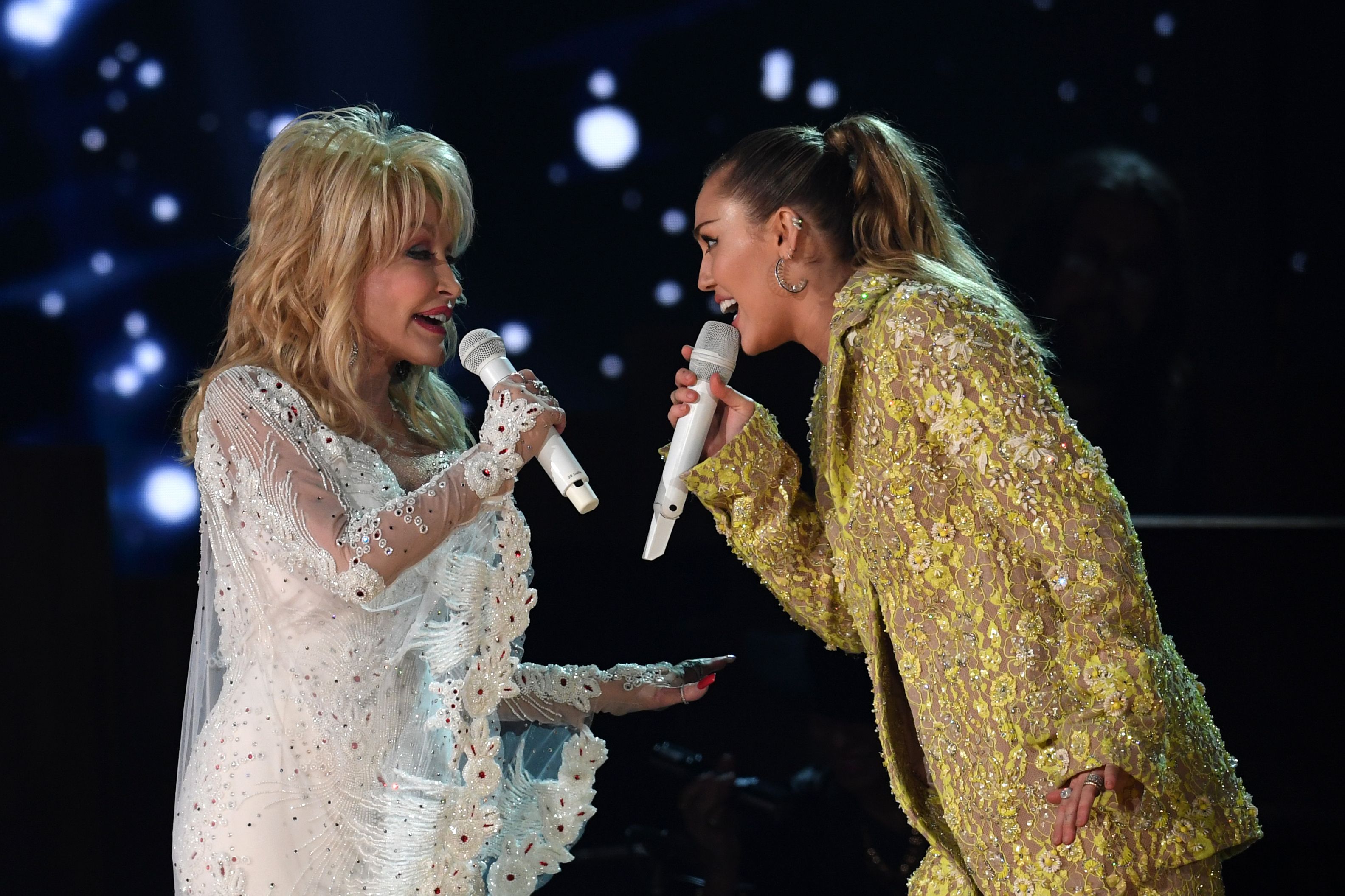 Dolly Parton and Miley Cyrus perform onstage during the 61st Annual Grammy Awards