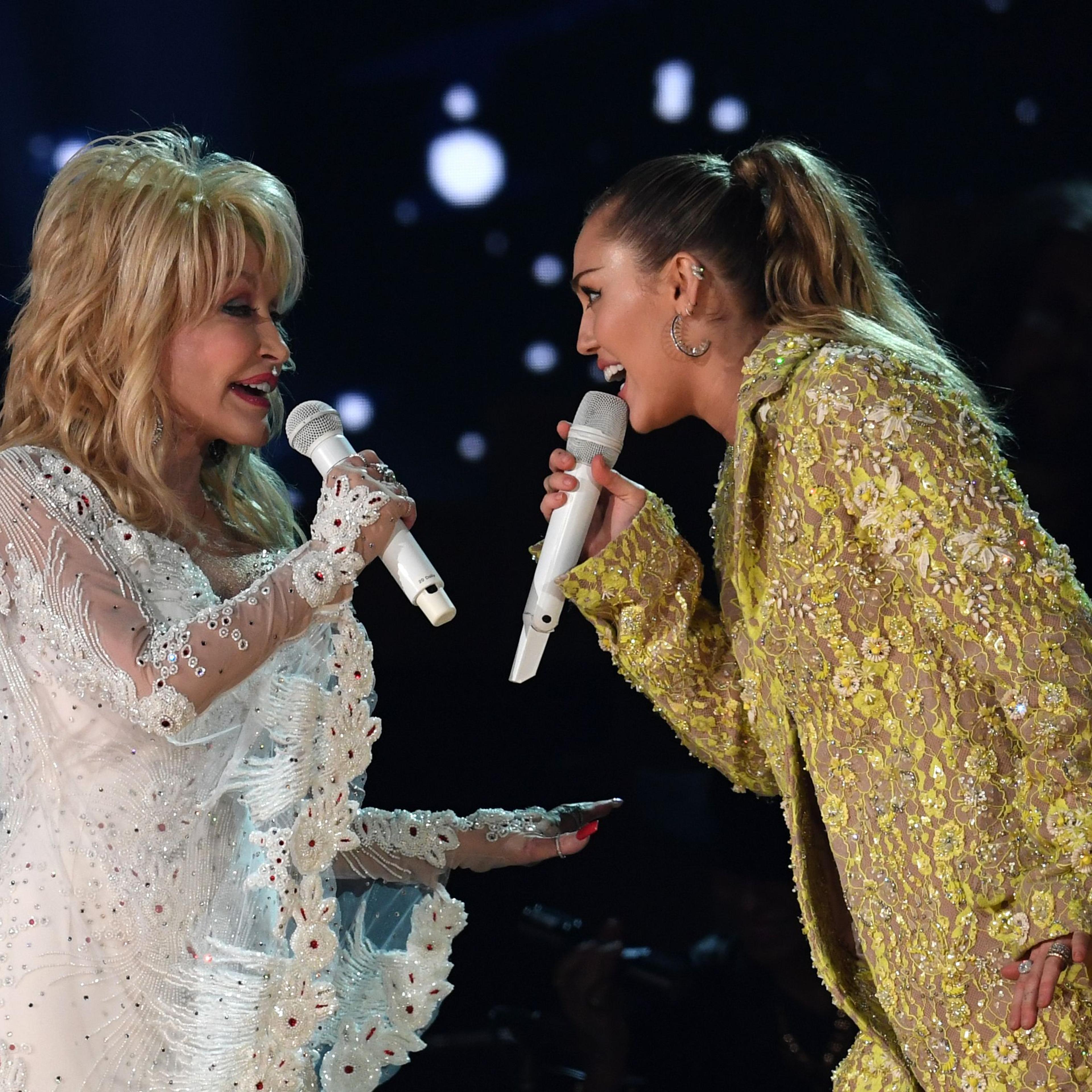 Dolly Parton and Miley Cyrus perform onstage during the 61st Annual Grammy Awards