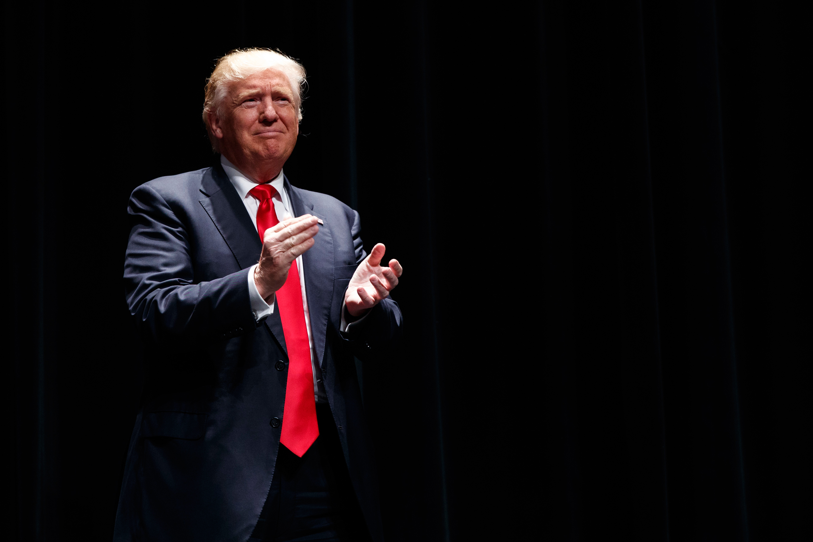 Republican presidential candidate Donald Trump arrives to speak at a campaign rally, Wednesday, Sept. 21, 2016, in Toledo, Ohio. (AP Photo/ Evan Vucci)