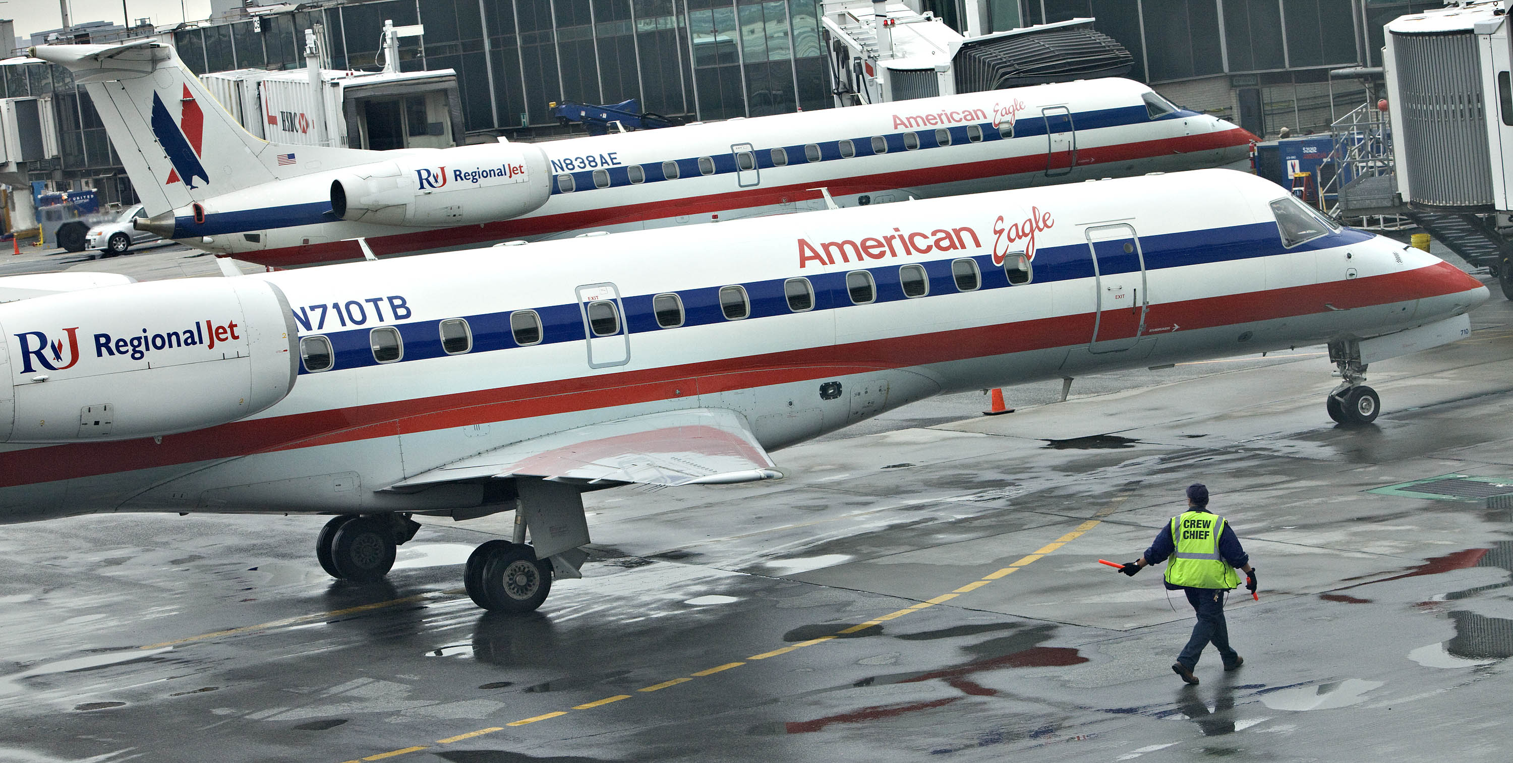 AMR Corp. American Eagle jets sit at gates outside the Centr