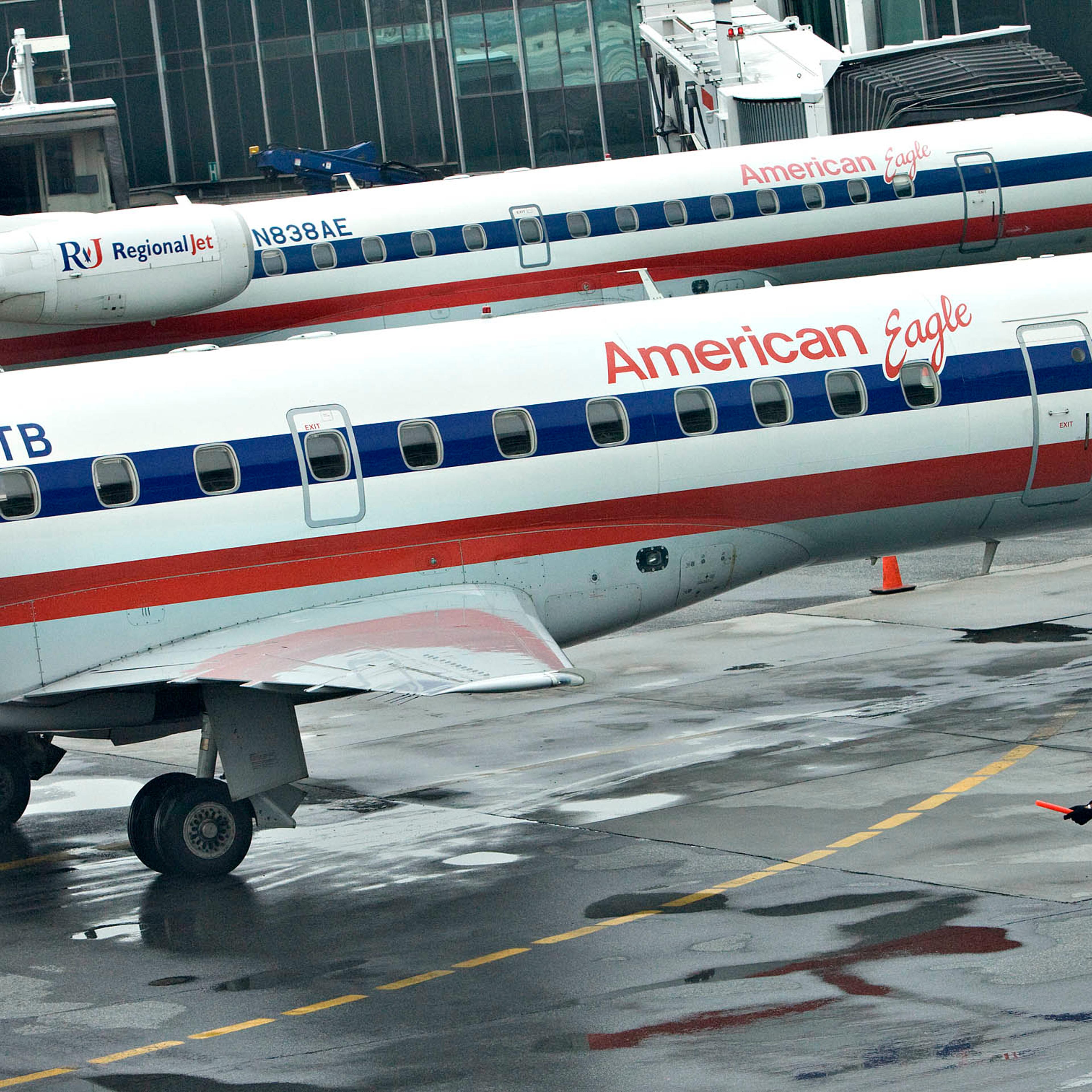 AMR Corp. American Eagle jets sit at gates outside the Centr