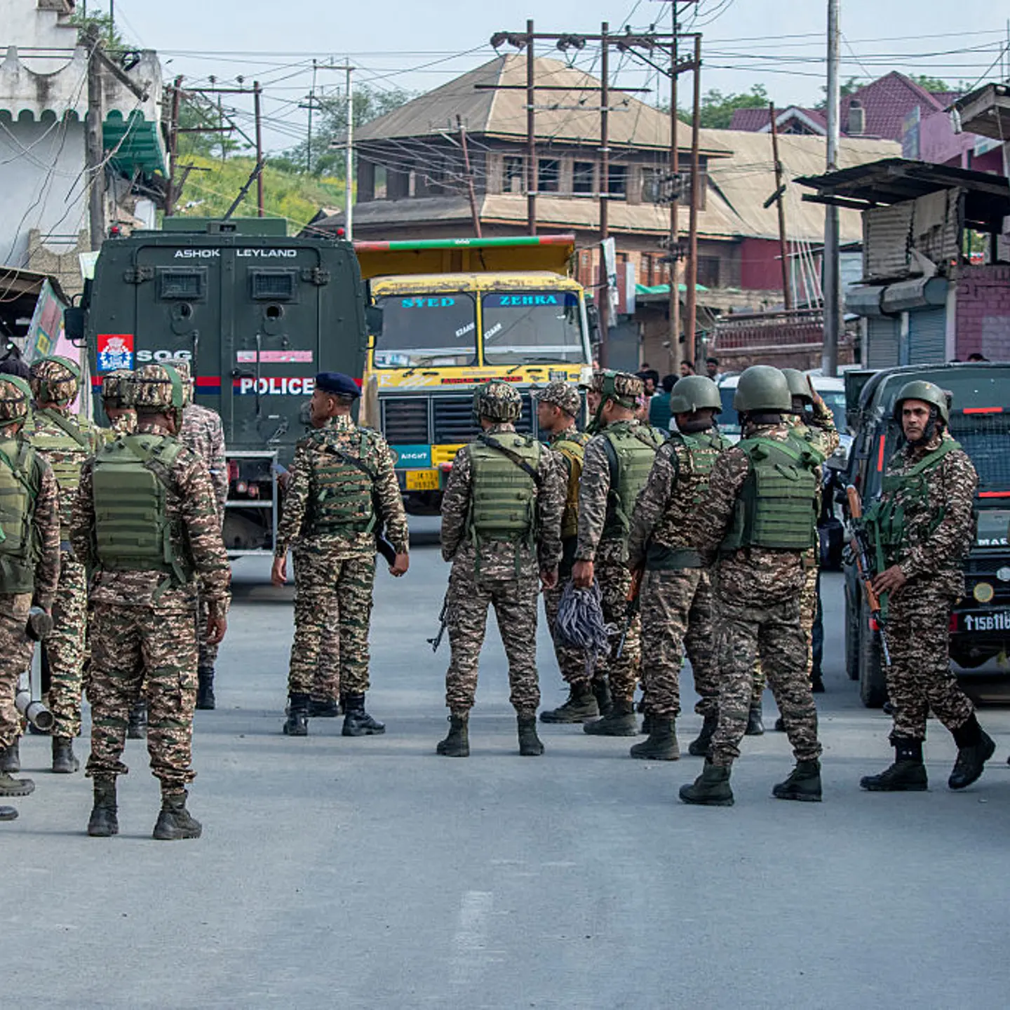 Indian paramilitary soldiers cordon off the area after an unknown aircraft crashed in Wuyan near Indian-administered Kashmir's main city of Srinagar.
