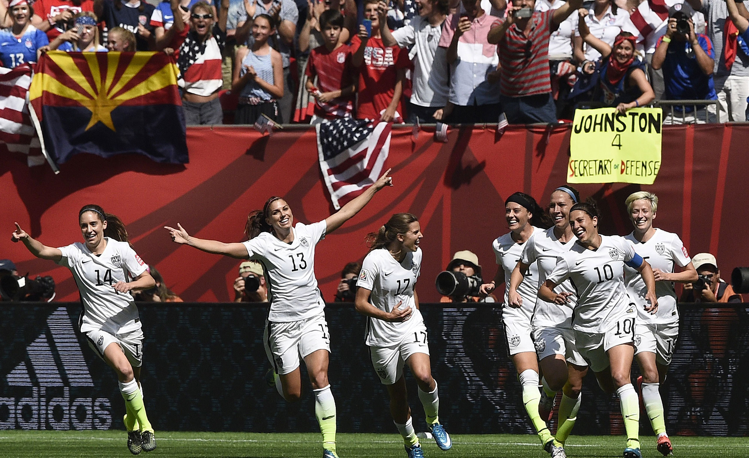 USA midfielder Carli Lloyd (10) celebrates her goal with teammates during the final football match between USA and Japan during their 2015 FIFA Women's World Cup at the BC Place Stadium in Vancouver on July 5, 2015. AFP PHOTO / FRANCK FIFEFRANCK FIFE/AFP