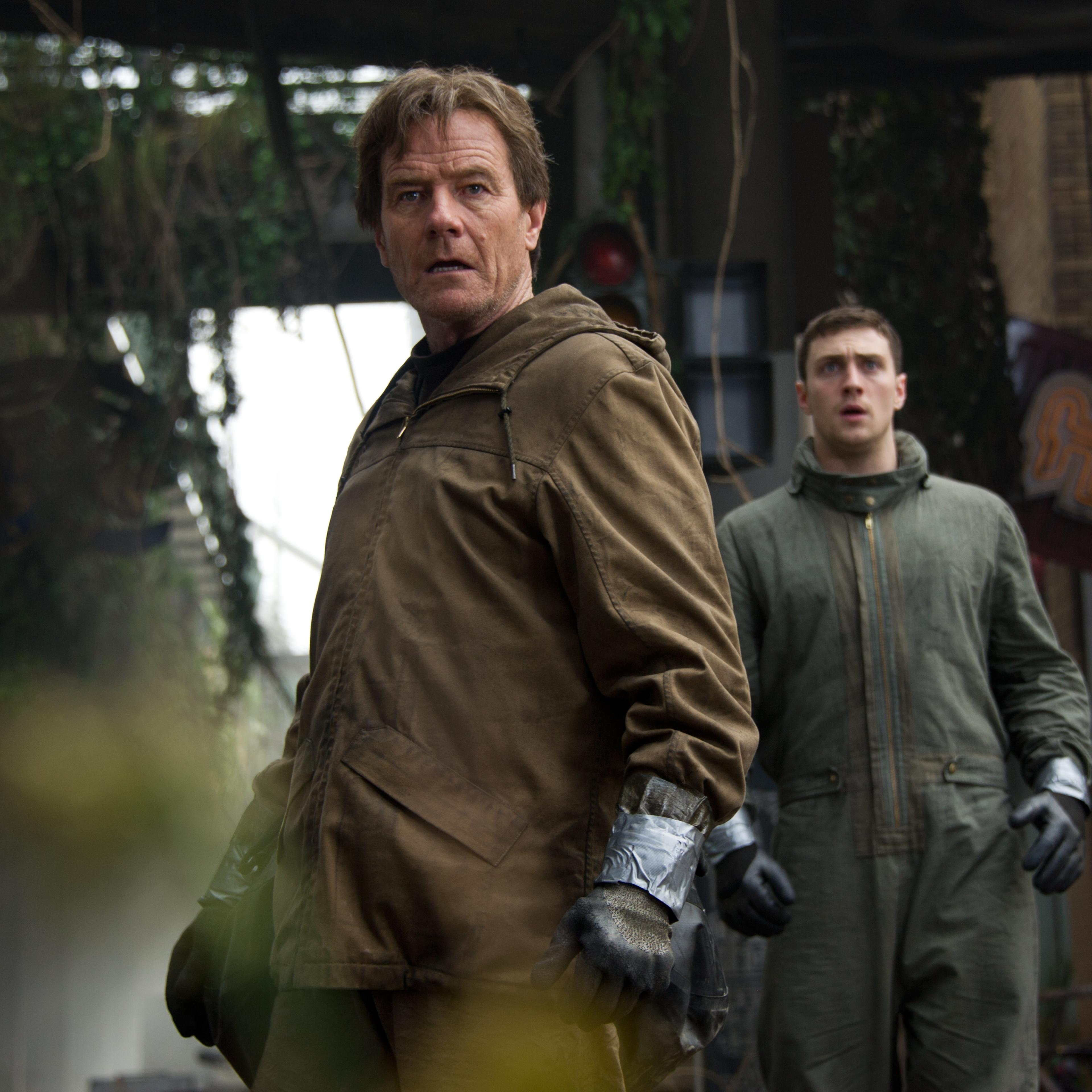 From left: Bryan Cranston and Aaron Taylor Johnson in Godzilla.