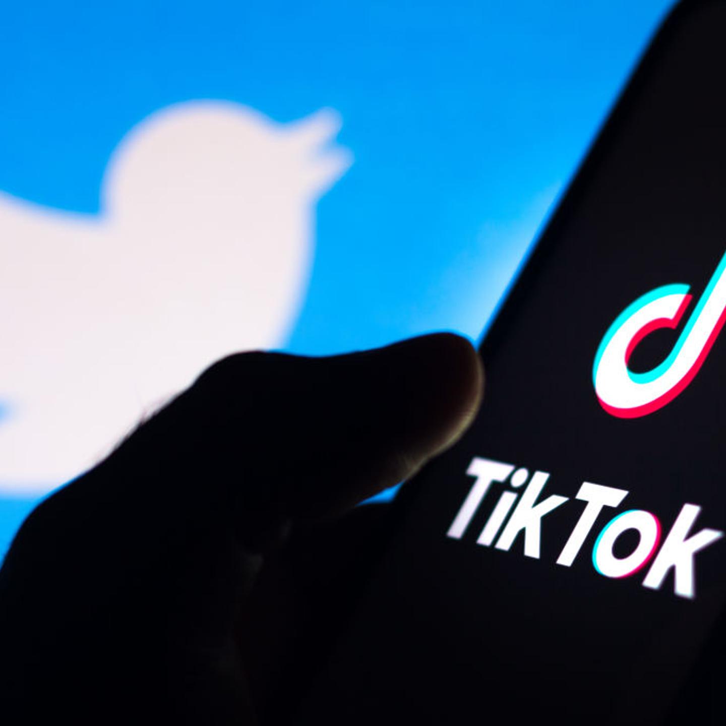In this photo illustration the TikTok logo seen displayed on