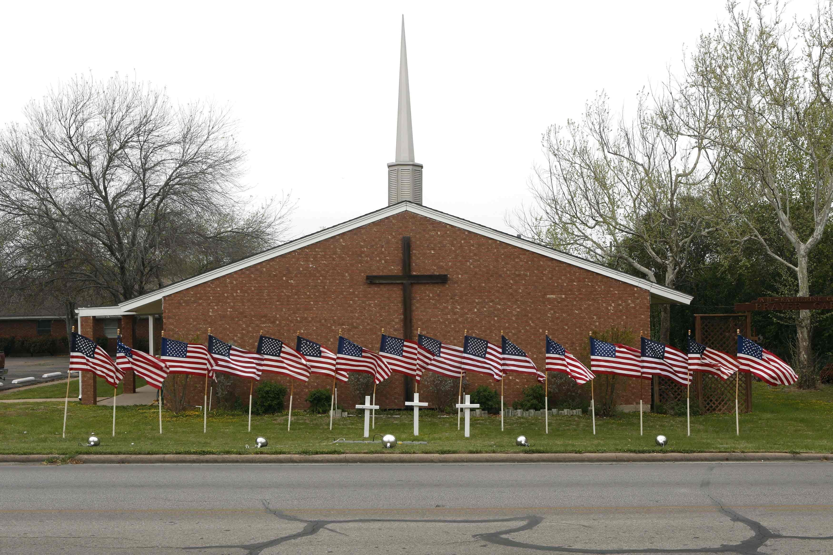 U.S. flags are pictured in front of the Central Christian Church in Killeen, Texas