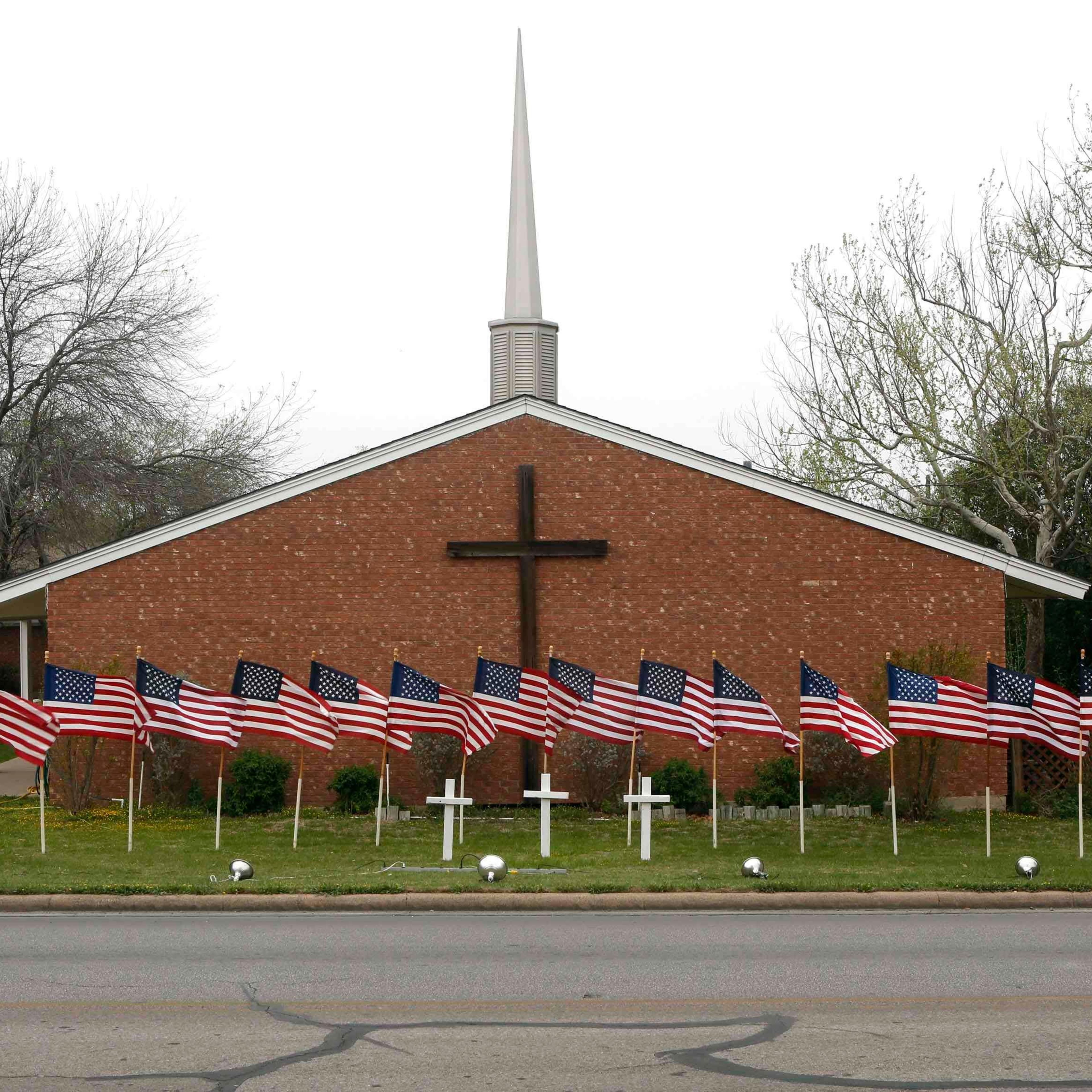 U.S. flags are pictured in front of the Central Christian Church in Killeen, Texas