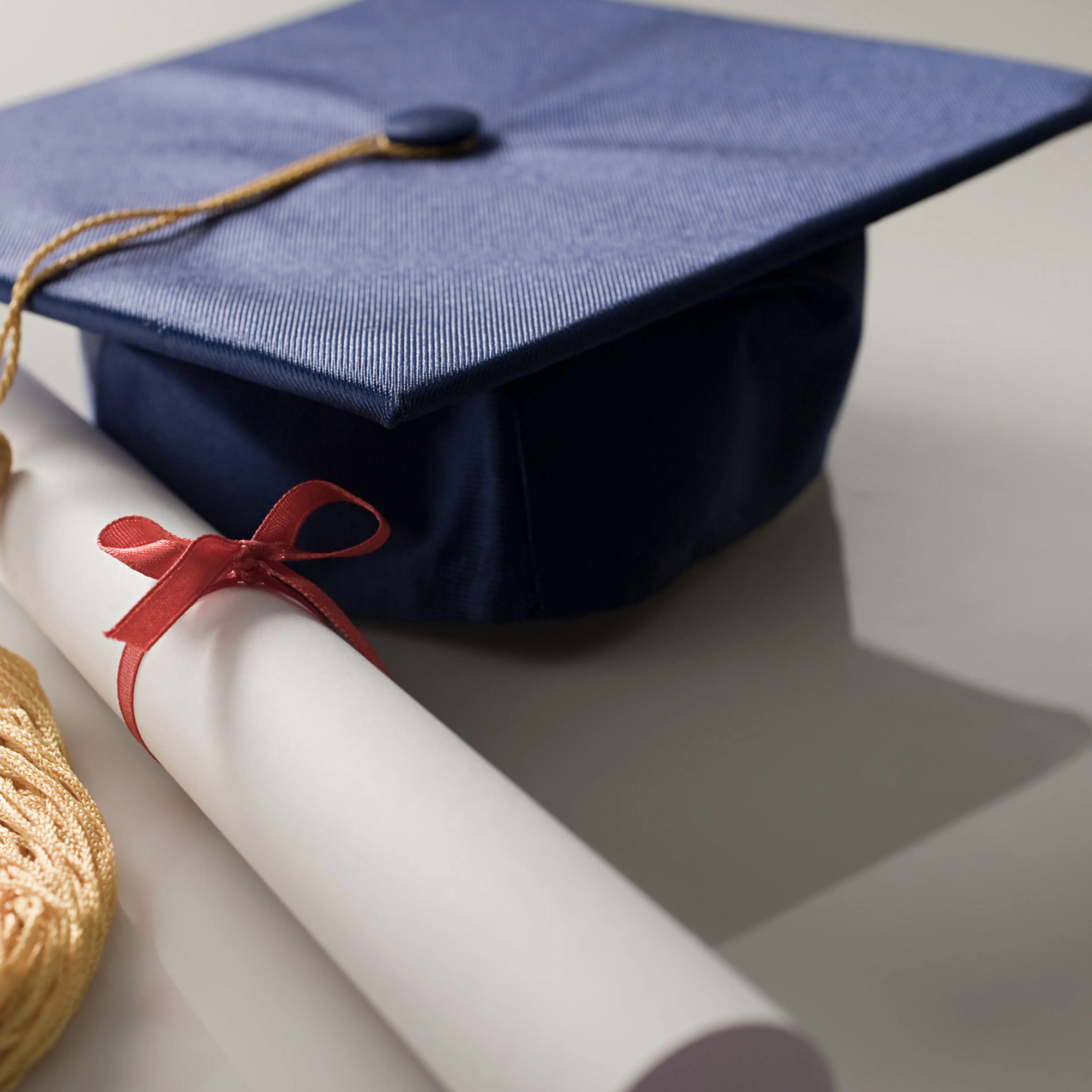 Scroll and mortarboard