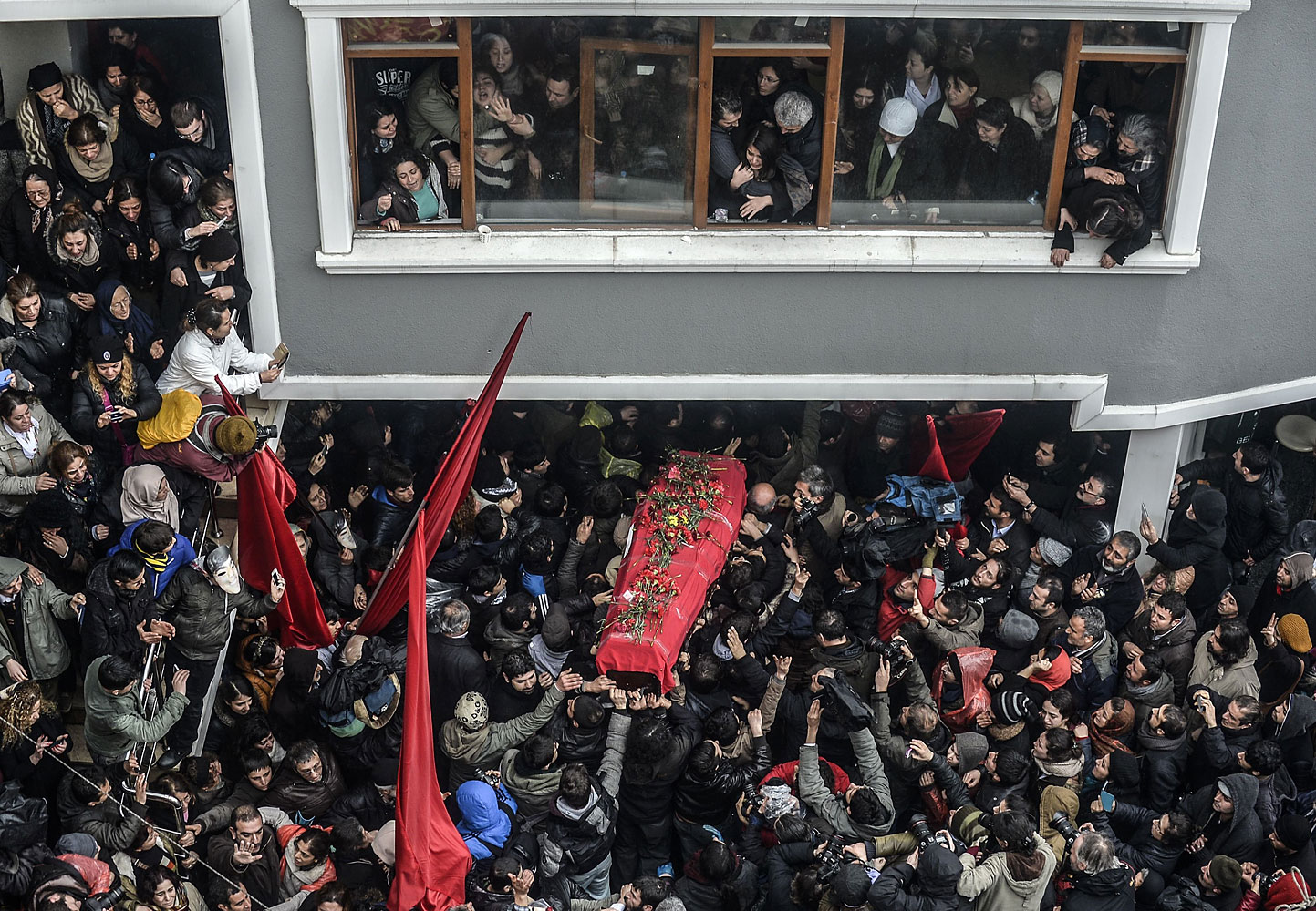 The coffin of Berkin Elvan is carried on March 11, 2014, in Istanbul. Berkin Elvan, who has been in a coma since June 2013 after being struck in the head by a gas canister during a police crackdown on protesters, died earlier on the day.