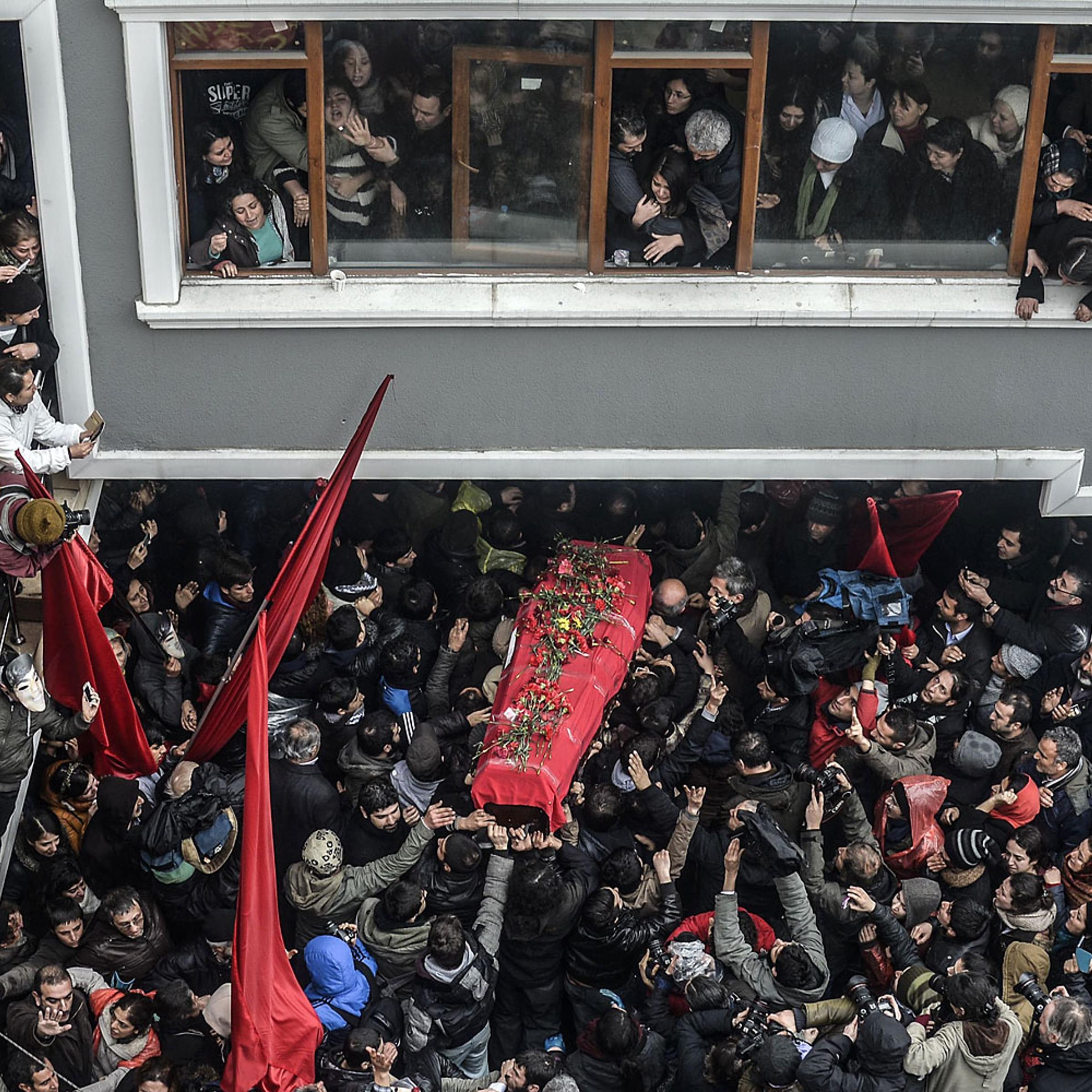 The coffin of Berkin Elvan is carried on March 11, 2014, in Istanbul. Berkin Elvan, who has been in a coma since June 2013 after being struck in the head by a gas canister during a police crackdown on protesters, died earlier on the day.