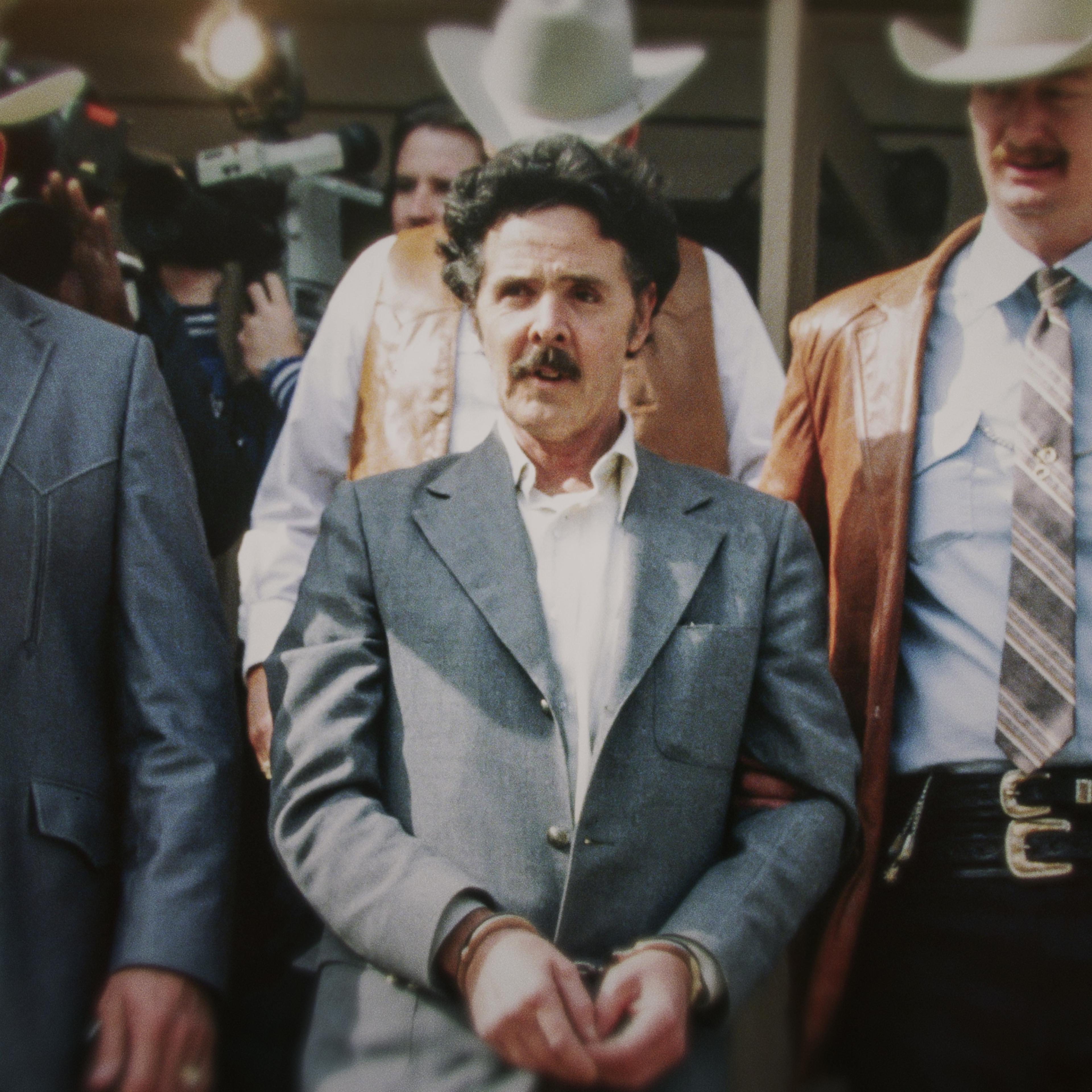 The Confession Killer — Henry Lee Lucas (center) being escorted by Ranger Bob Prince (left) and task force
