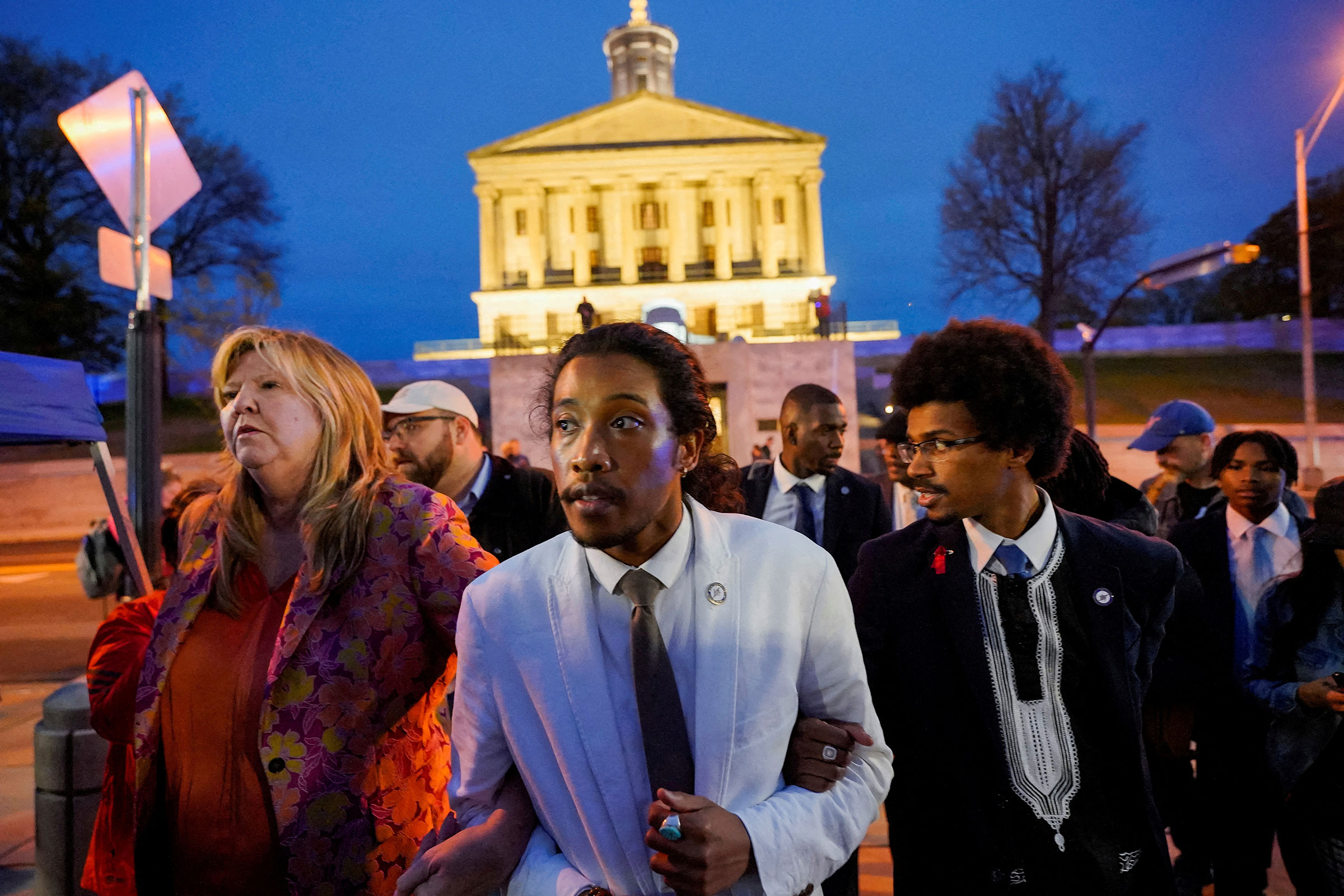 Rep. Gloria Johnson, Rep. Justin Jones, Rep. Justin Pearson leave the Tennessee State Capitol after a vote at the Tennessee House of Representatives to expel two Democratic members for their roles in a gun control demonstration at the statehouse last wee