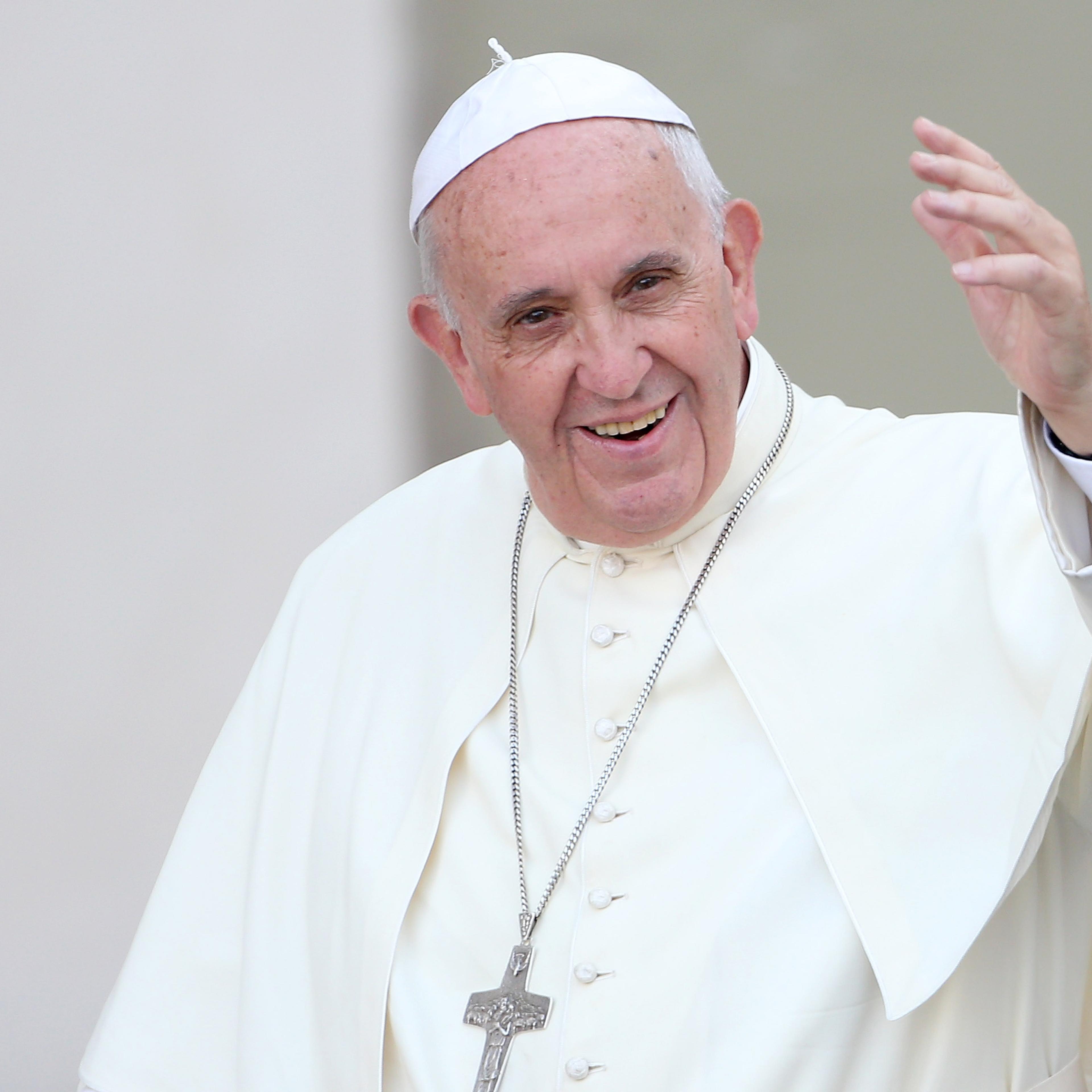 Pope Francis waves to the faithful as he arrives in St. Peter's Square for a meeting with the Roman Diocesans on June 14, 2015 in Vatican City, Vatican.