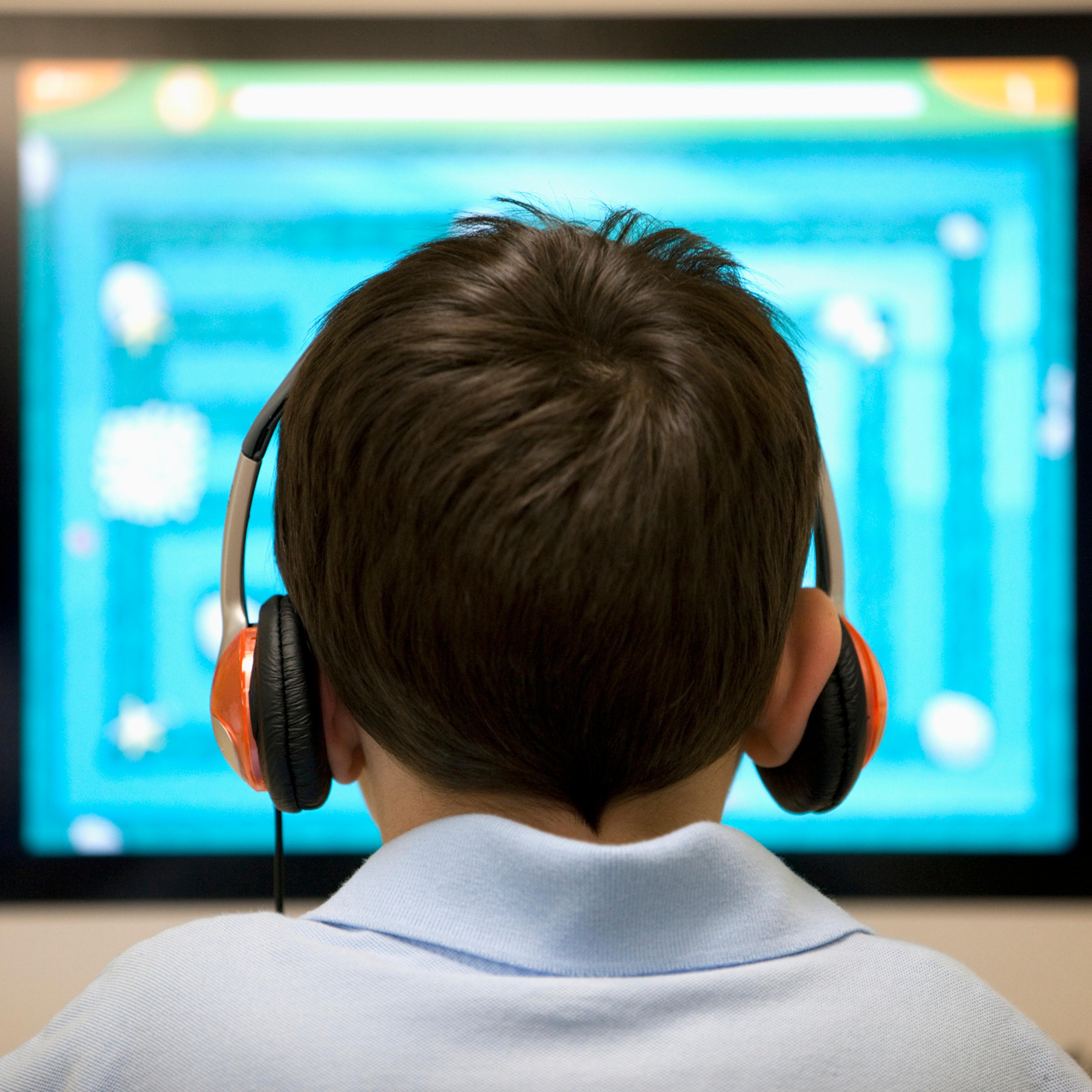 School boy in a computer lab.