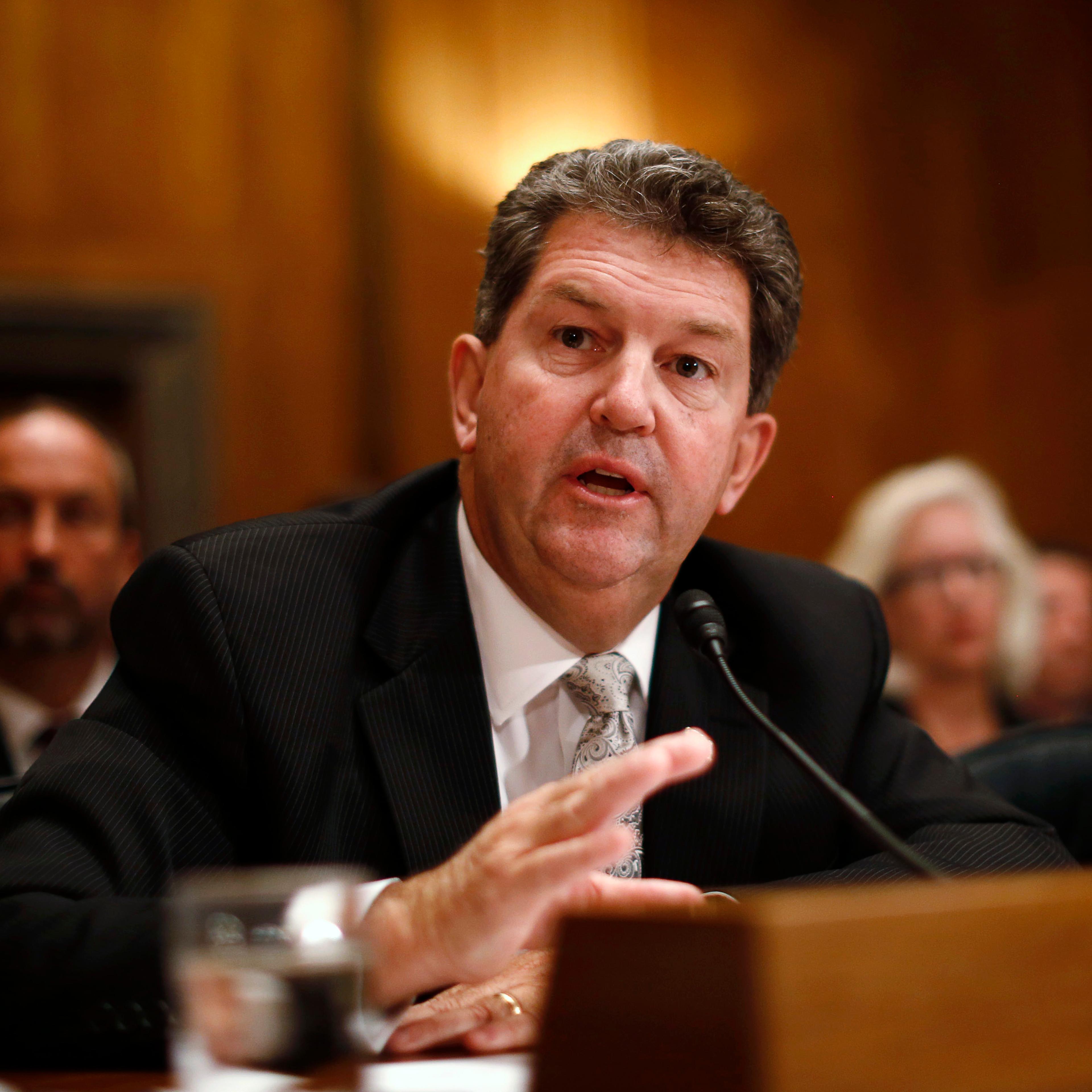 U.S. Postmaster General Donahoe speaks at a hearing on reforming the U.S. postal service, in Washington