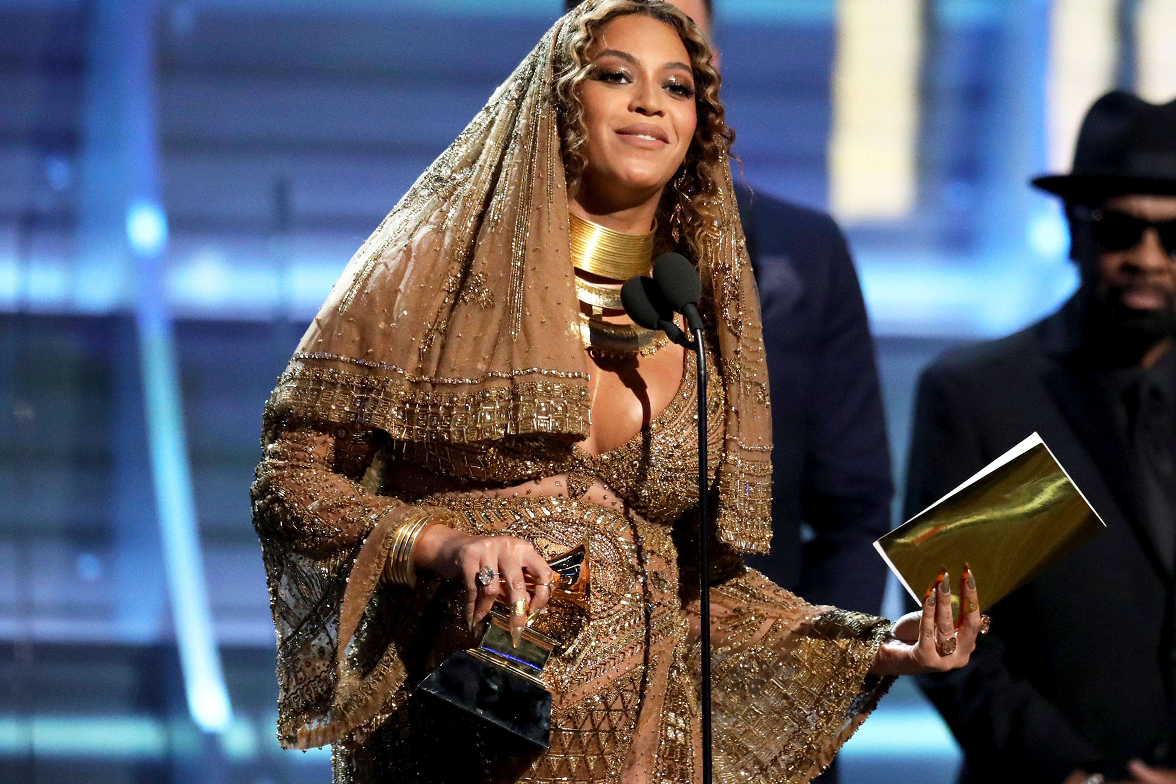 Beyoncé accepts the award for best urban contemporary album for Lemonade at the 59th annual Grammy Awards, on Feb. 12, 2017 in Los Angeles.