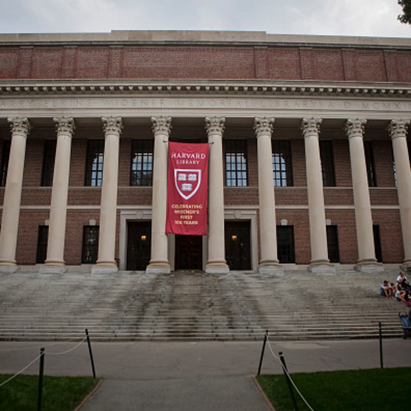 Students and visitors pass by the Widener Library on the Harvard University Campus in Cambridge, MA, Tuesday June 30, 2015.