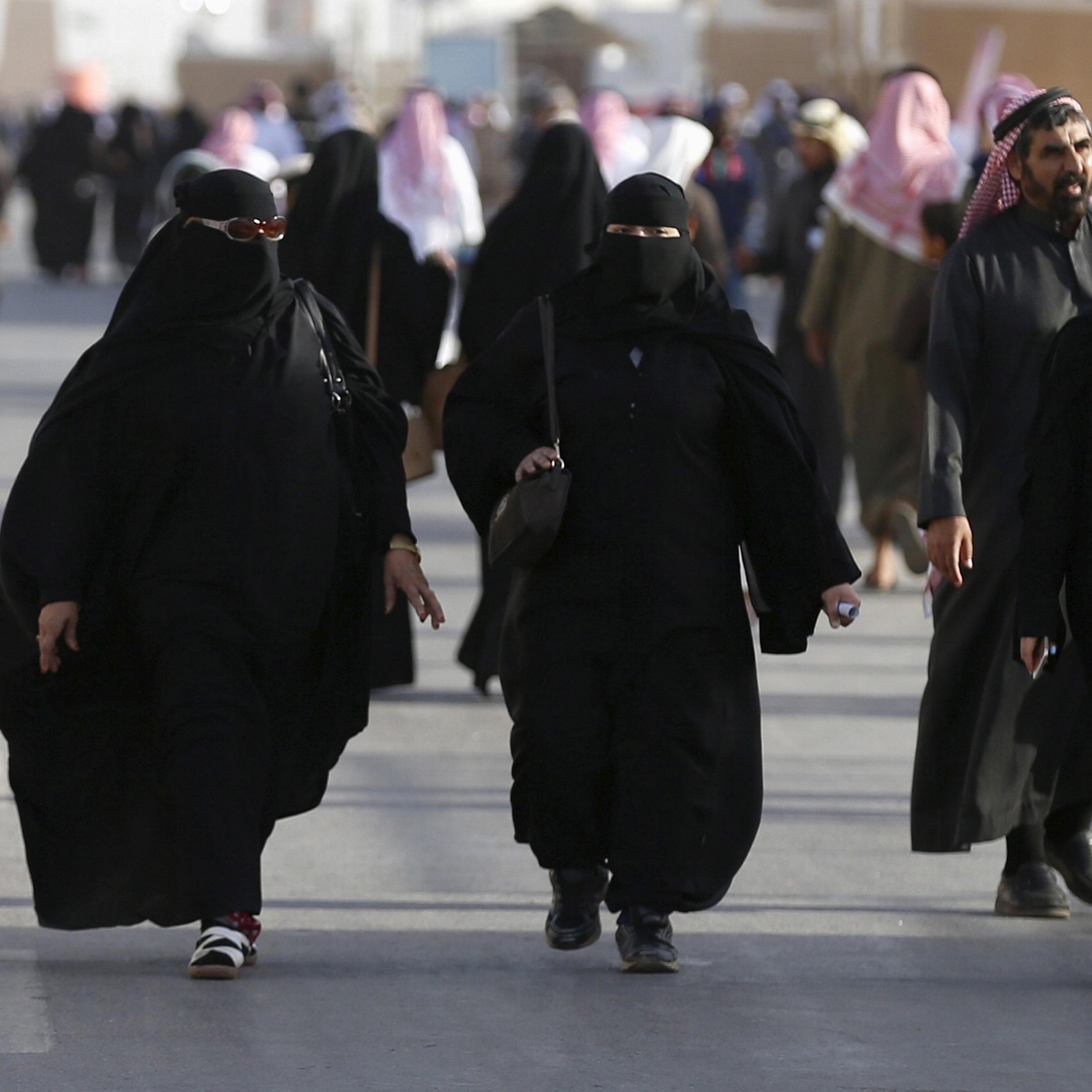Saudi women walk on the outskirts of Riyadh, Saudi Arabia on Feb. 8, 2016.