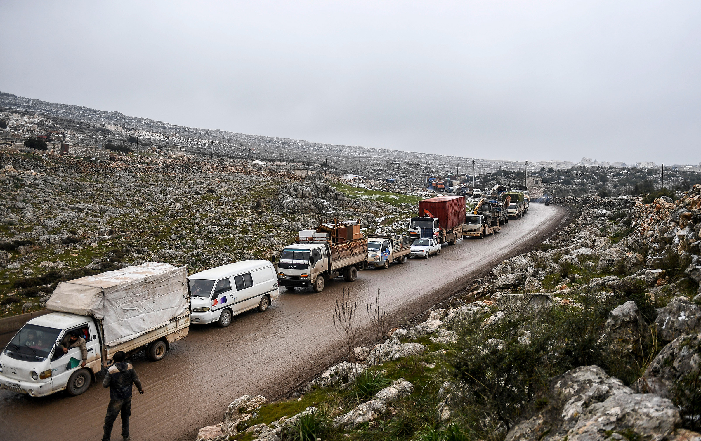 Syrian civilians flee Idlib on Feb. 13