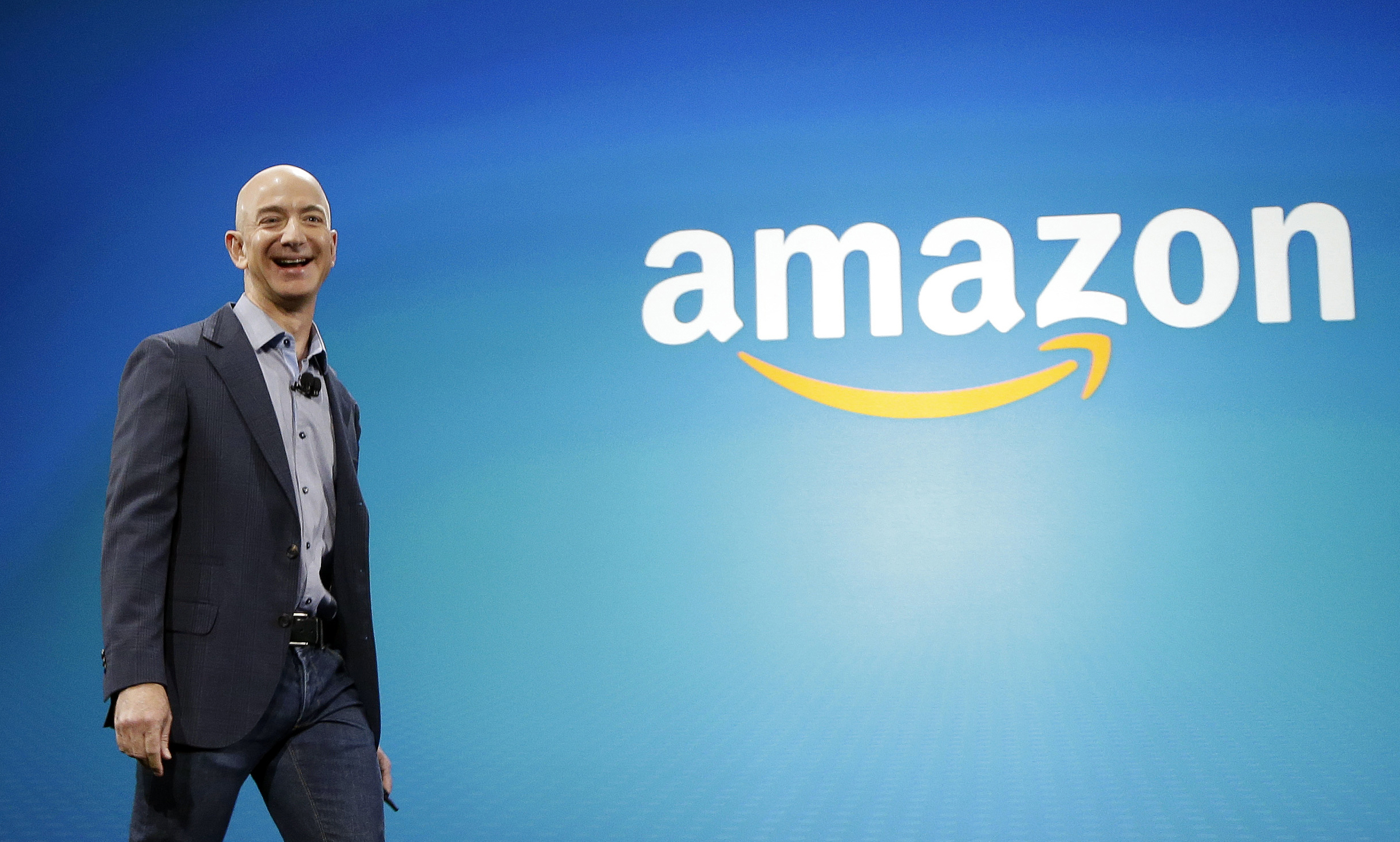 Amazon CEO Jeff Bezos walks onstage for the launch of the new Amazon Fire Phone in Seattle on June 16, 2014.