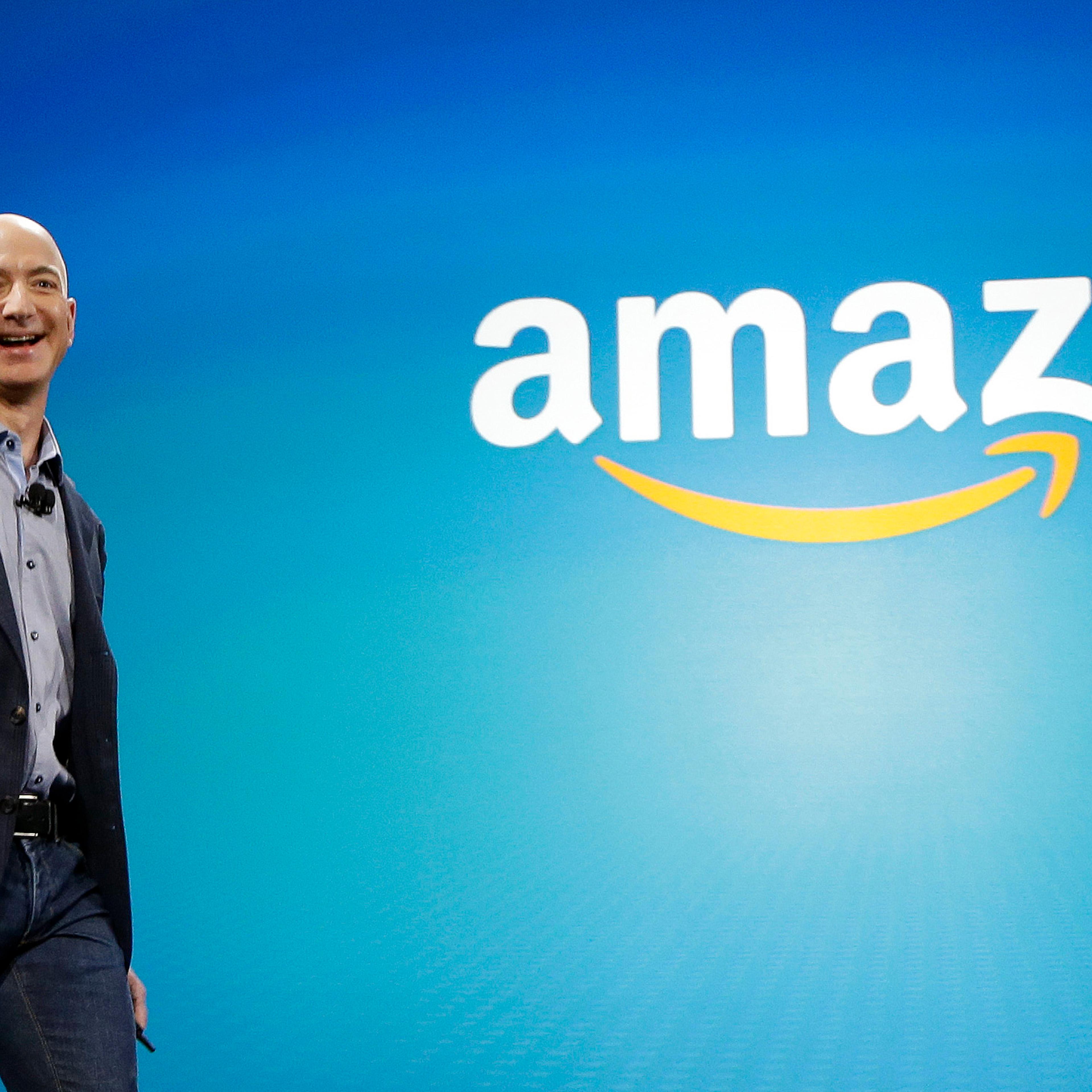 Amazon CEO Jeff Bezos walks onstage for the launch of the new Amazon Fire Phone in Seattle on June 16, 2014.