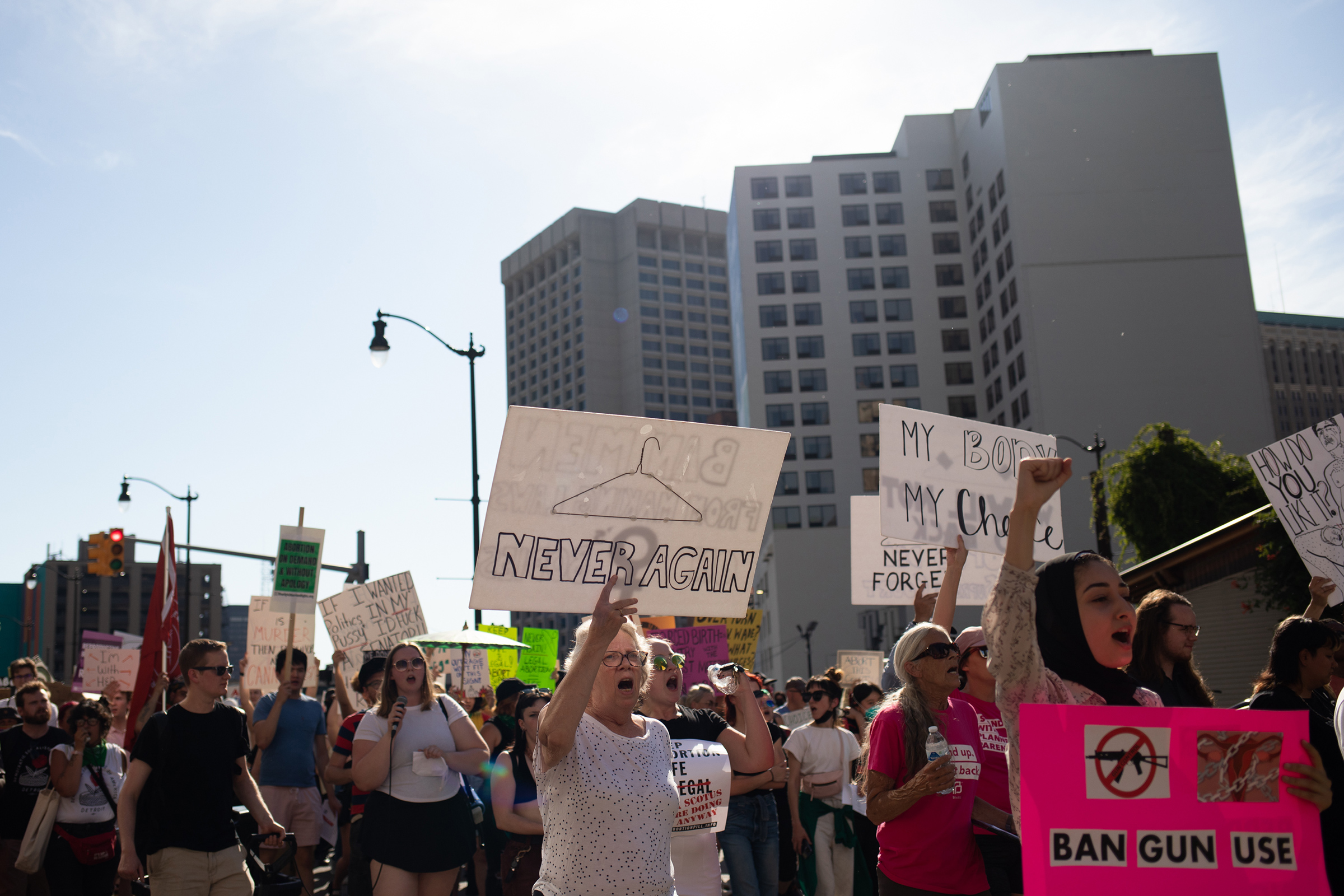 Abortion rights demonstrators march through the streets to protest the Supreme Court's decision in the Dobbs v. Jackson Women's Health case on June 24 in Detroit, Mich.