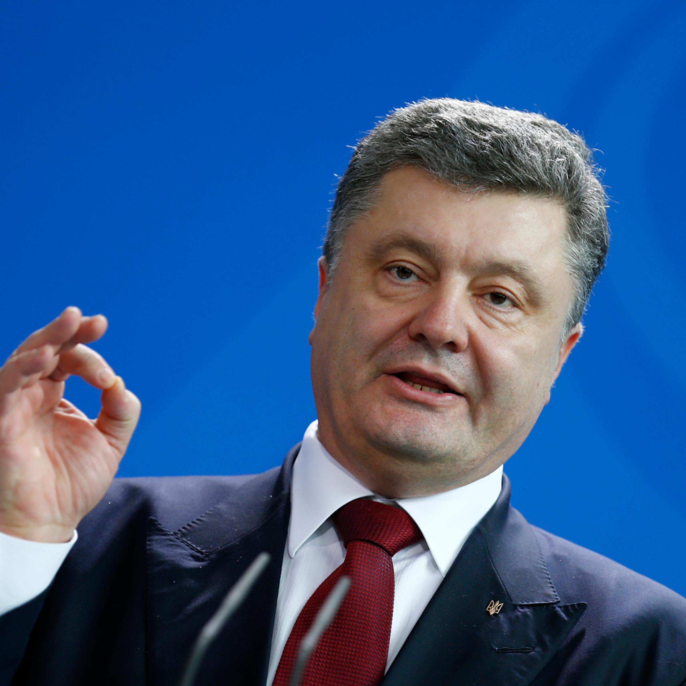 Ukrainian President Poroshenko addresses news conference following talks in Berlin