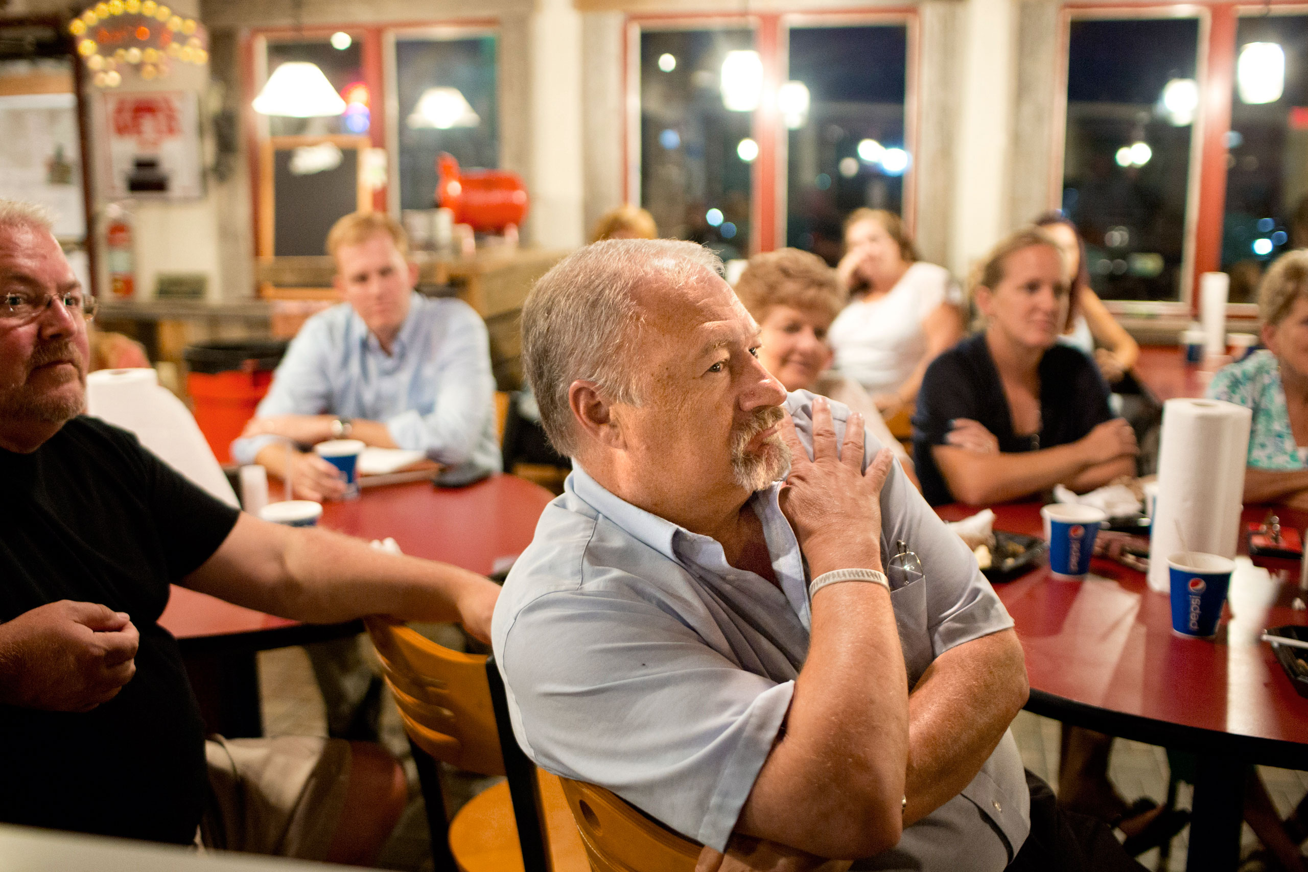 Jackson, Ohio, Mayor Randy Heath, center, at a town forum to air a range of political views