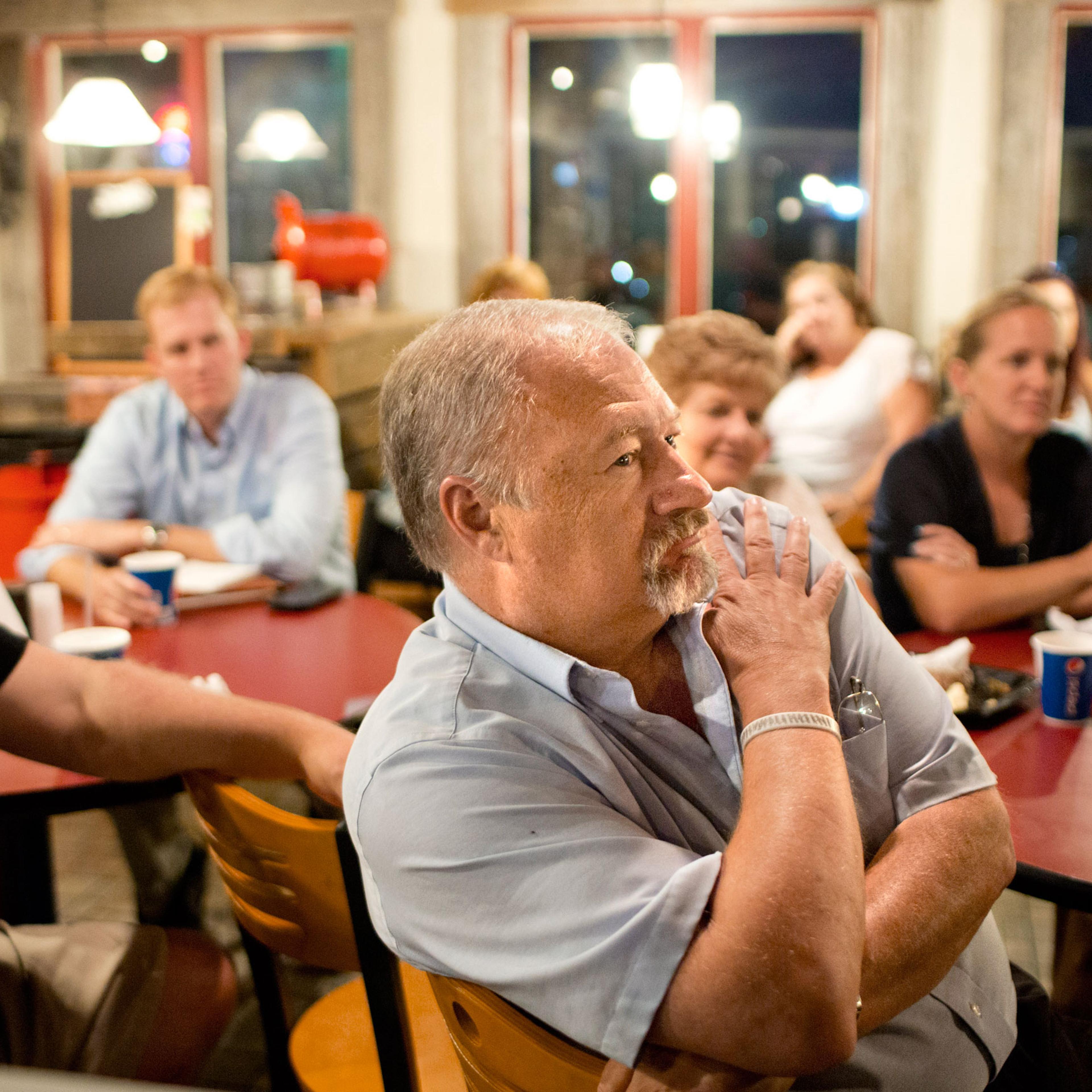 Jackson, Ohio, Mayor Randy Heath, center, at a town forum to air a range of political views
