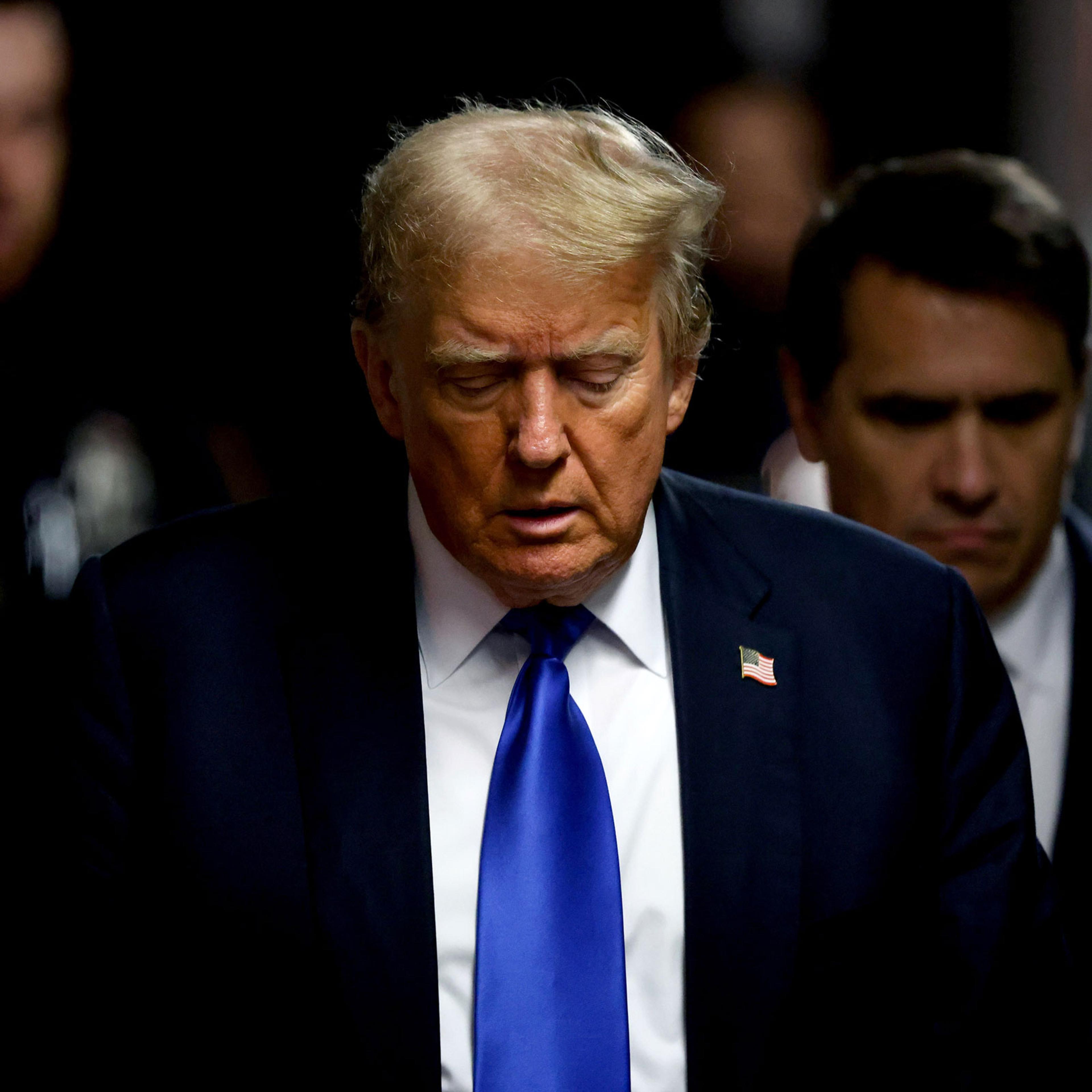 Former U.S. President Donald Trump, center, and attorney Todd Blanche, center right, arrive at Manhattan criminal court in New York City, on May 30, 2024.