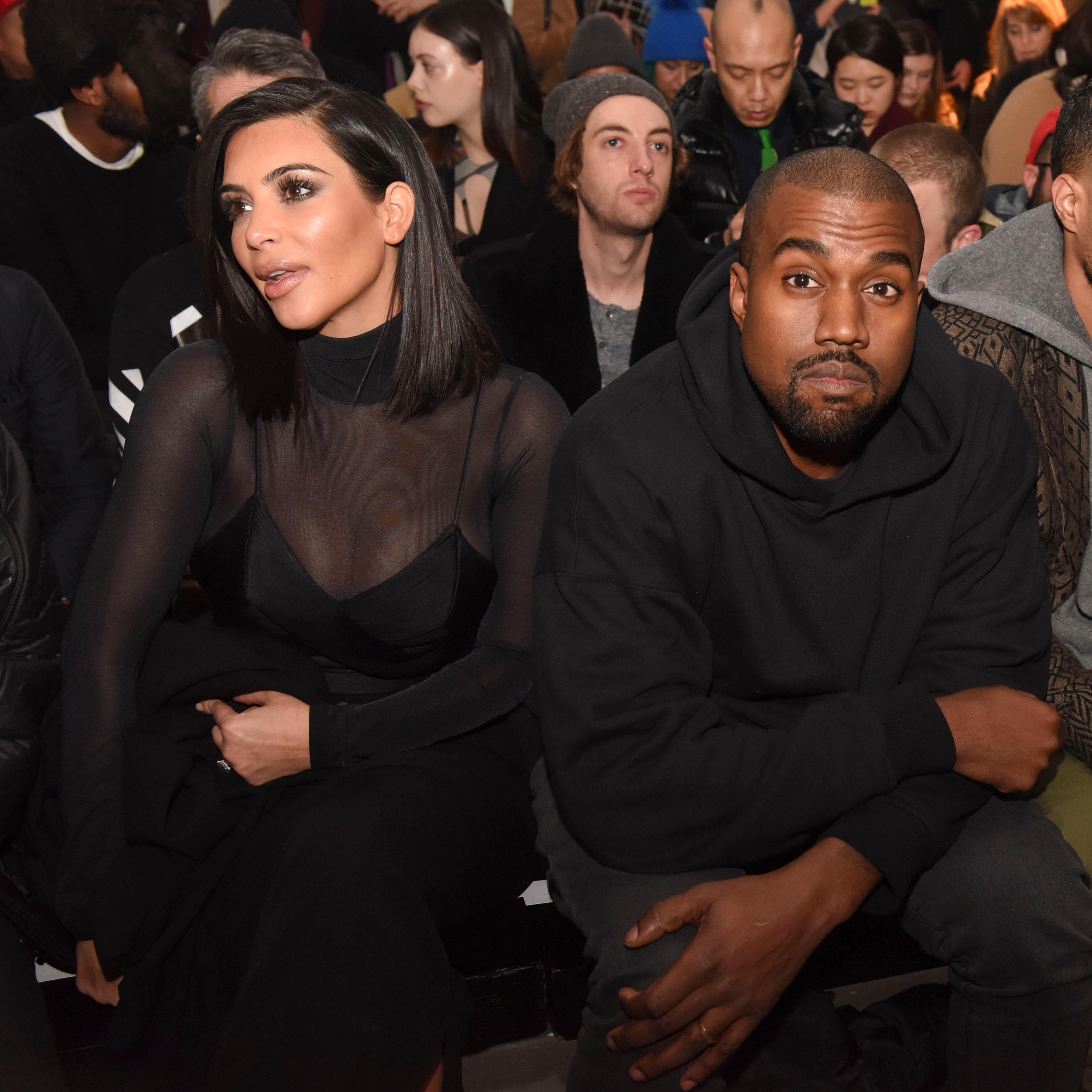 Kim Kardashian and Kanye West attend the Robert Geller show during Mercedes-Benz Fashion Week Fall 2015 at Pier 59 on Feb. 14, 2015 in New York City.