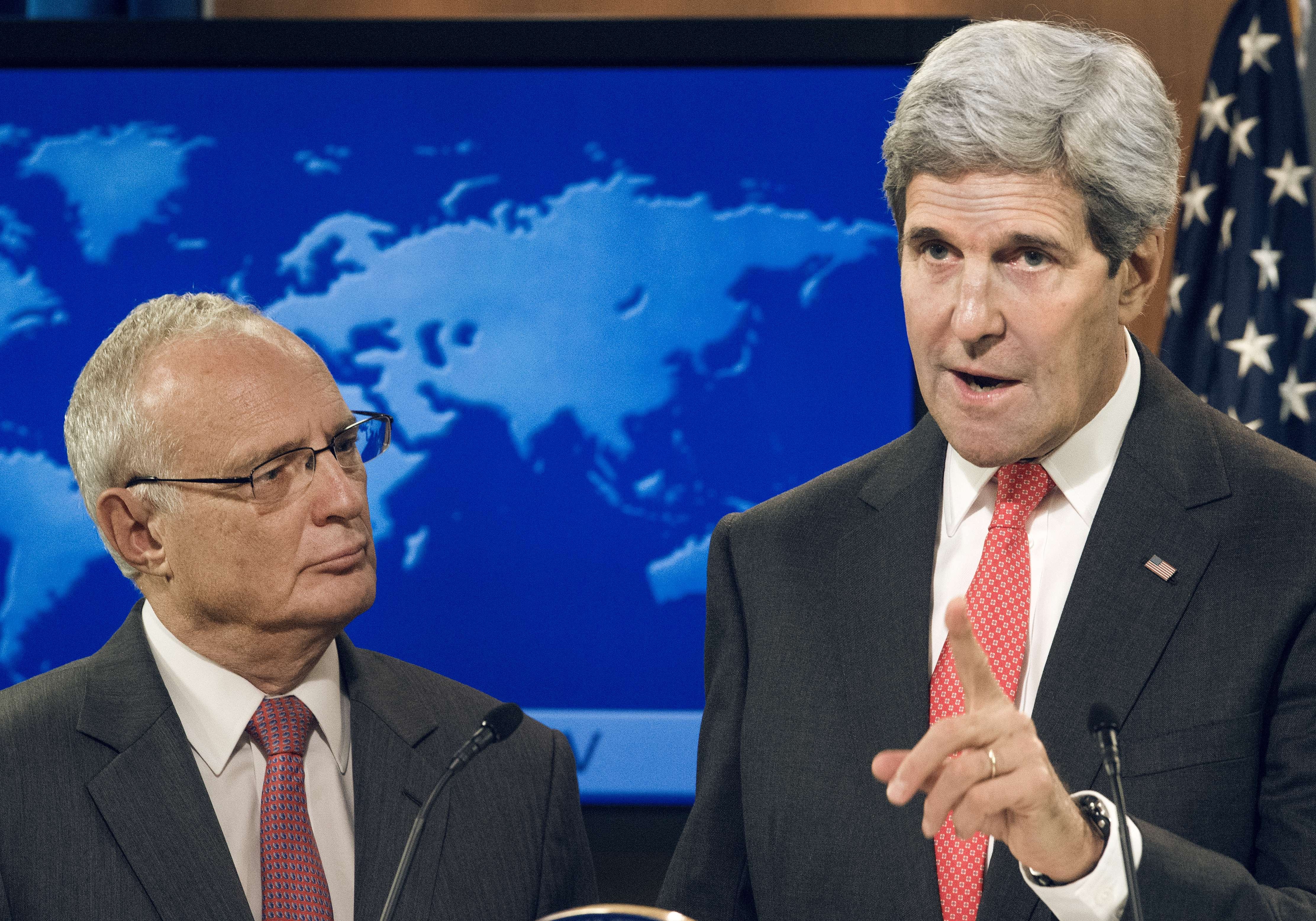 US Secretary of State John Kerry stands with Rabbi David Saperstein, the nominee for ambassador-at-large for international religious freedom, the first non-Christian to hold the job, while delivering remarks regarding the 2013 Annual Report on Internatio