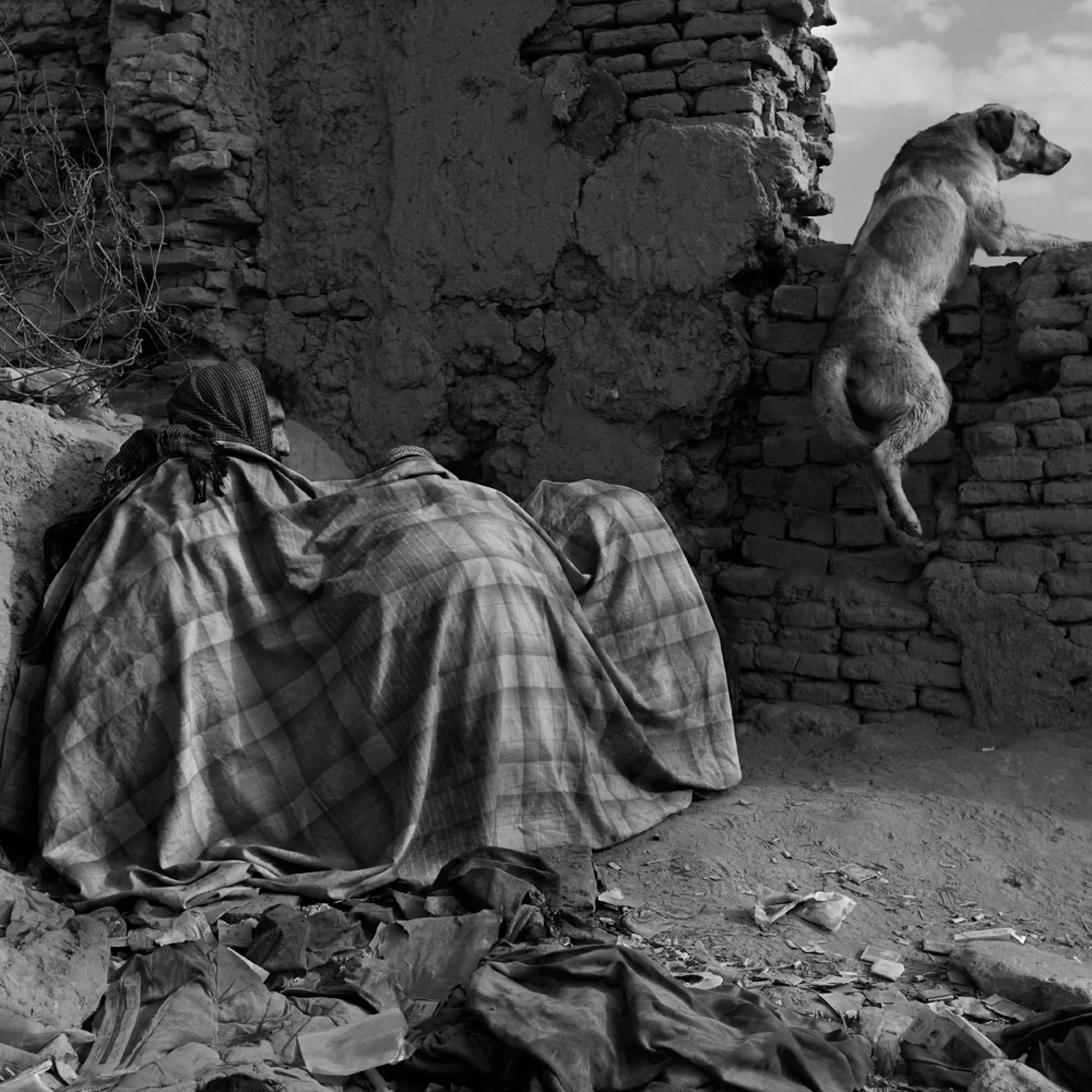 Inside the bomb-blasted ruins of Kabul’s old town, the morning crowd of heroin addicts huddle under woolen blankets to keep the cold out and noxious smoke in.