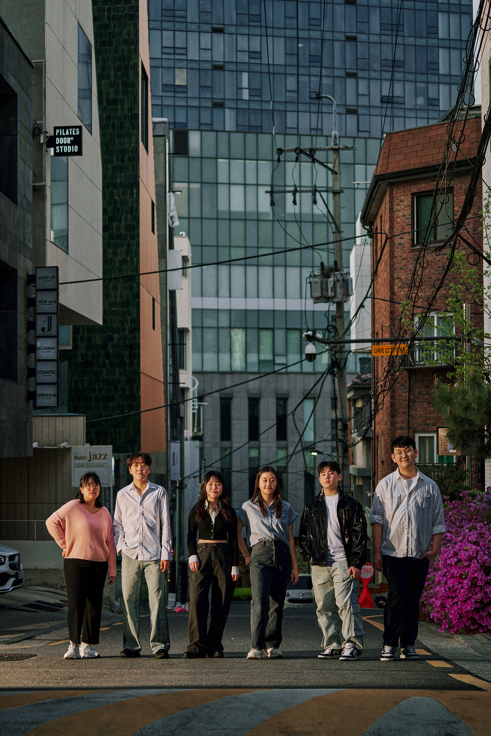 From left, peer specialists Yeon Gahyeon, Derrick Park, Moon Dana, Jeongbin Park, Aiden Won Kim, Lee Jaehyun in Gangnam.