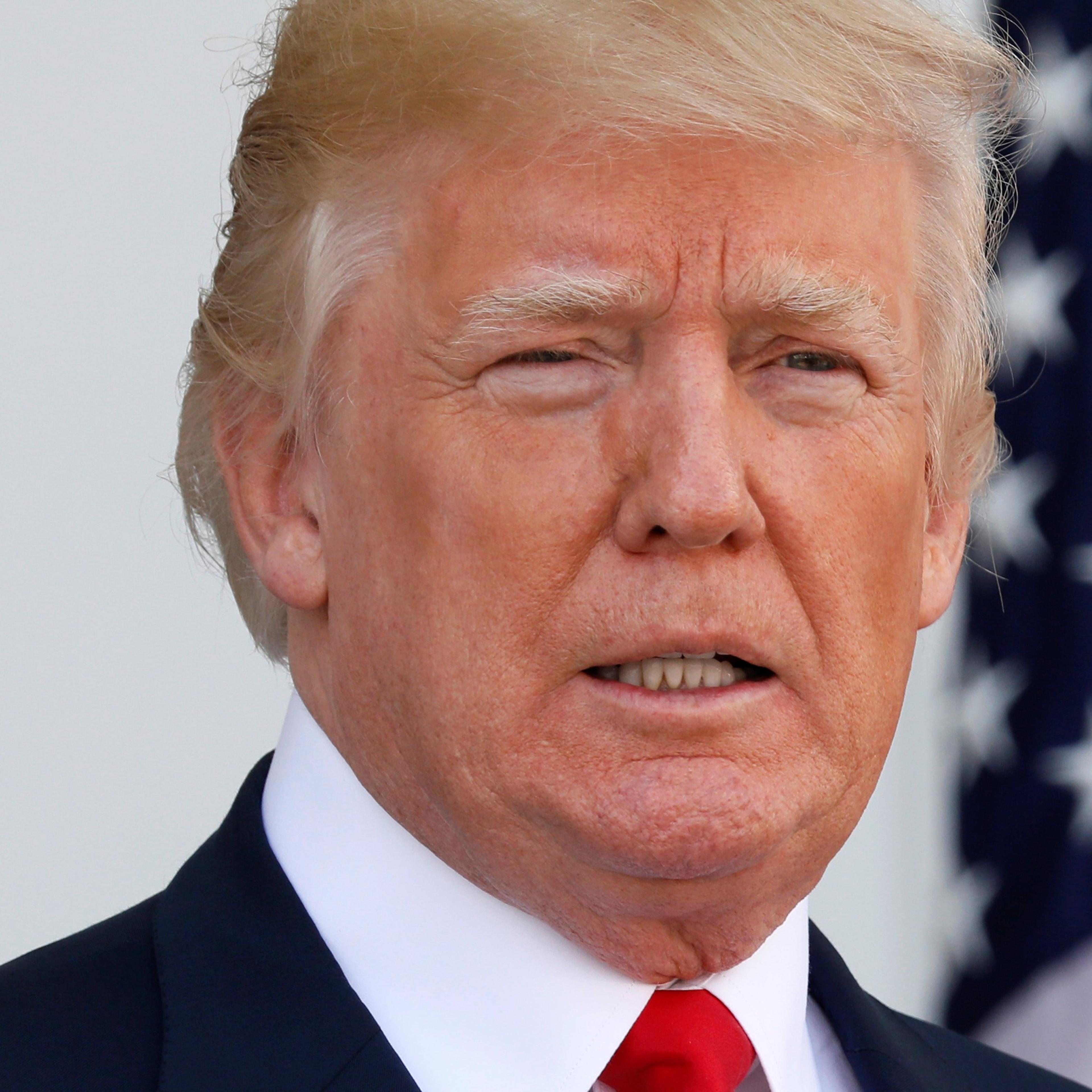 President Donald Trump speaks to reporters at Trump's golf estate in Bedminster, New Jersey Aug. 10, 2017.