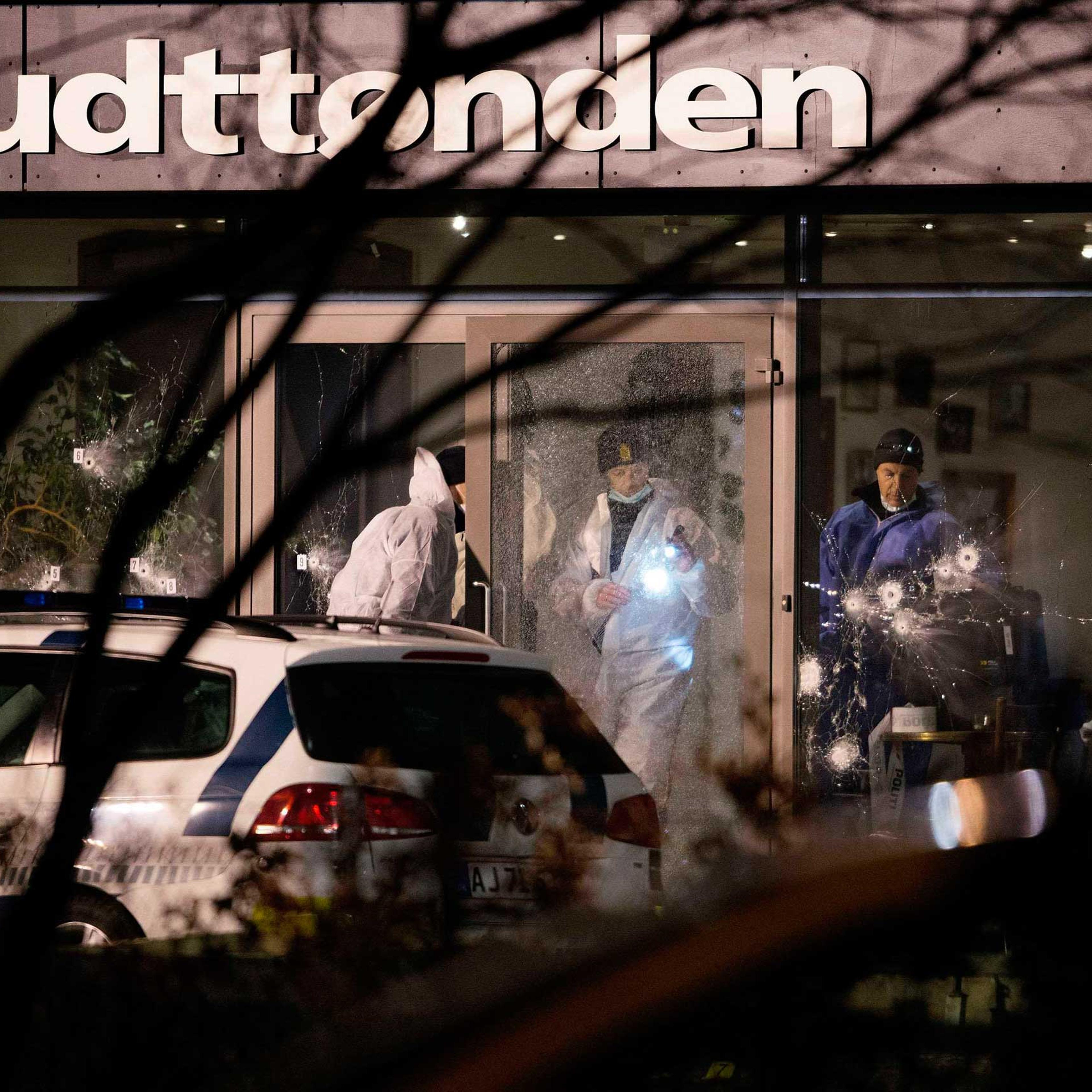 Forensic investigators are seen at the site of a shooting in Copenhagen, Feb. 14, 2015.