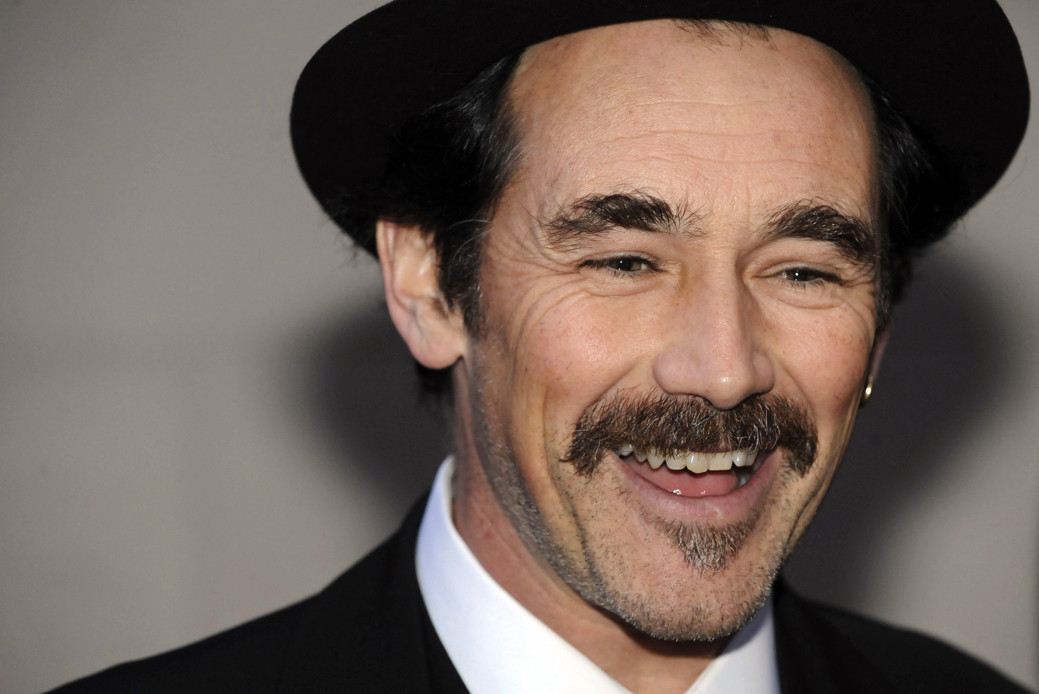 British actor Rylance arrives to attend the 2010 Laurence Olivier Awards in central London