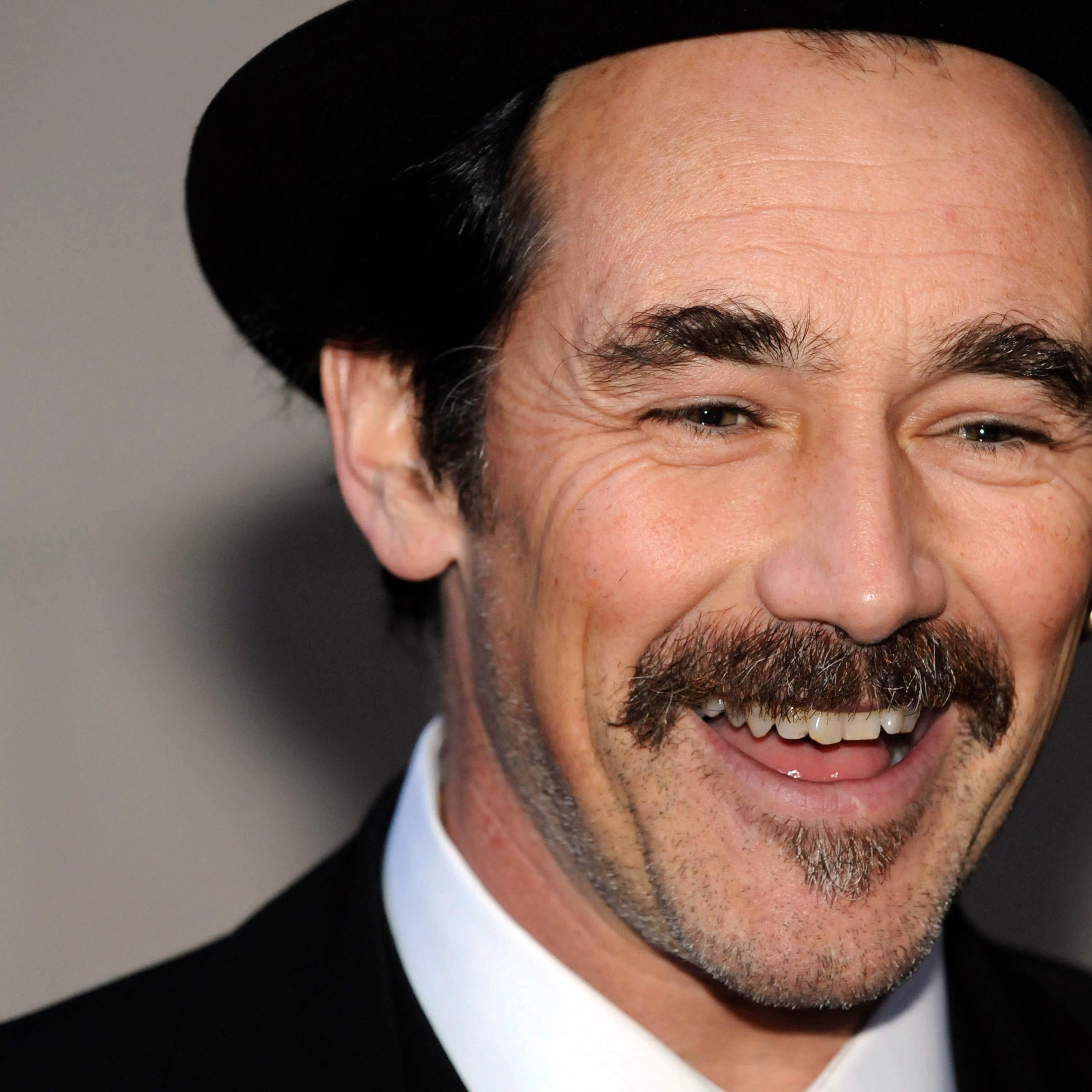 British actor Rylance arrives to attend the 2010 Laurence Olivier Awards in central London