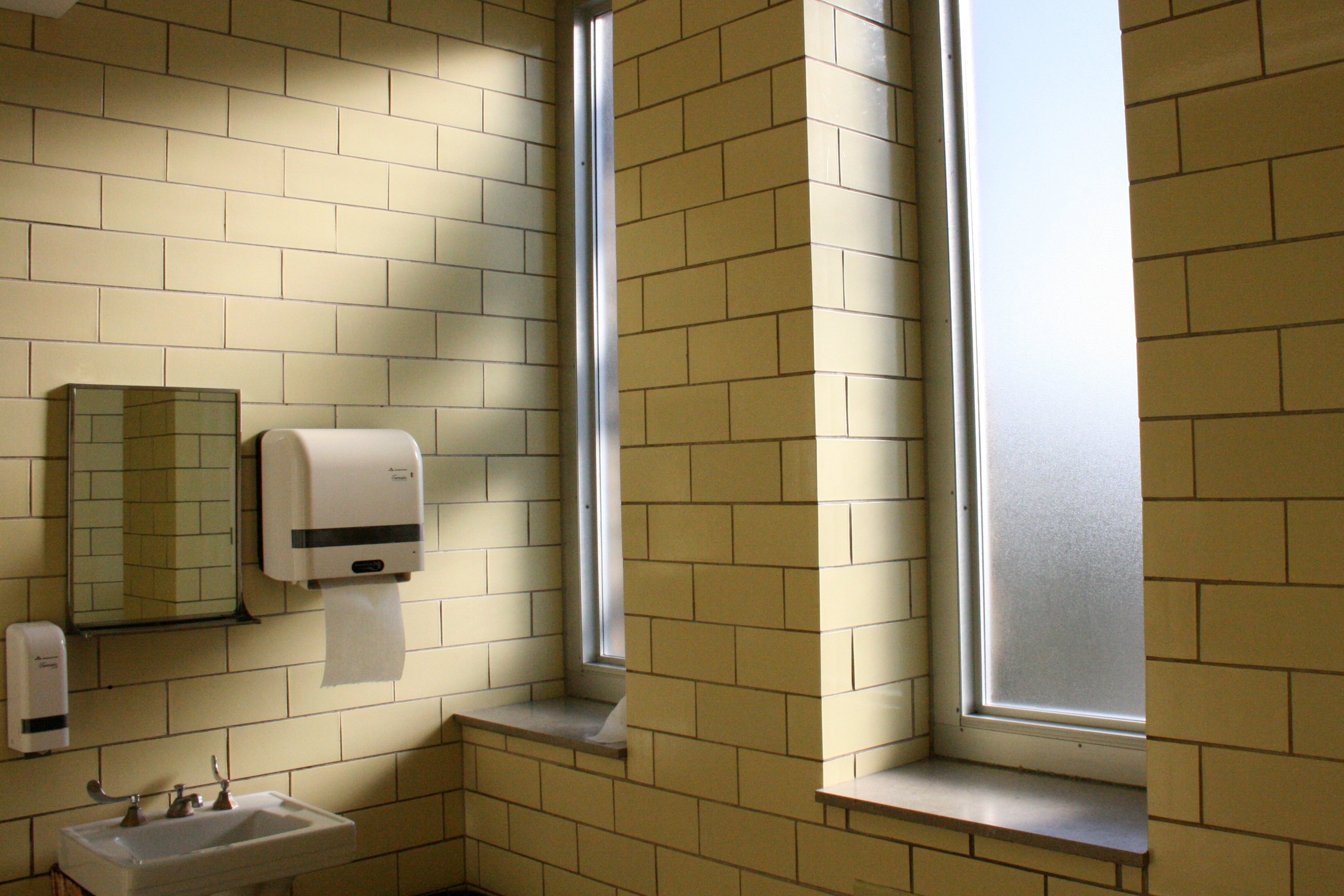 teacher leaves gun bathroom resigns