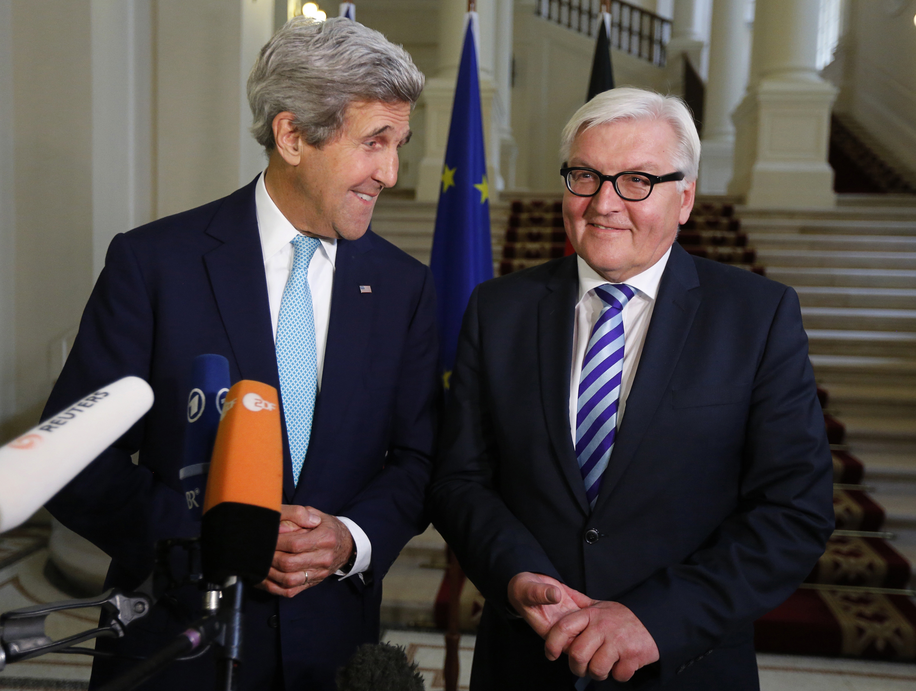 U.S. Secretary of State John Kerry, left and German Foreign Minister Frank-Walter Steinmeier during a press conference, after talks between the foreign ministers of the six powers negotiating with Tehran on its nuclear program, in Vienna, Austria on July