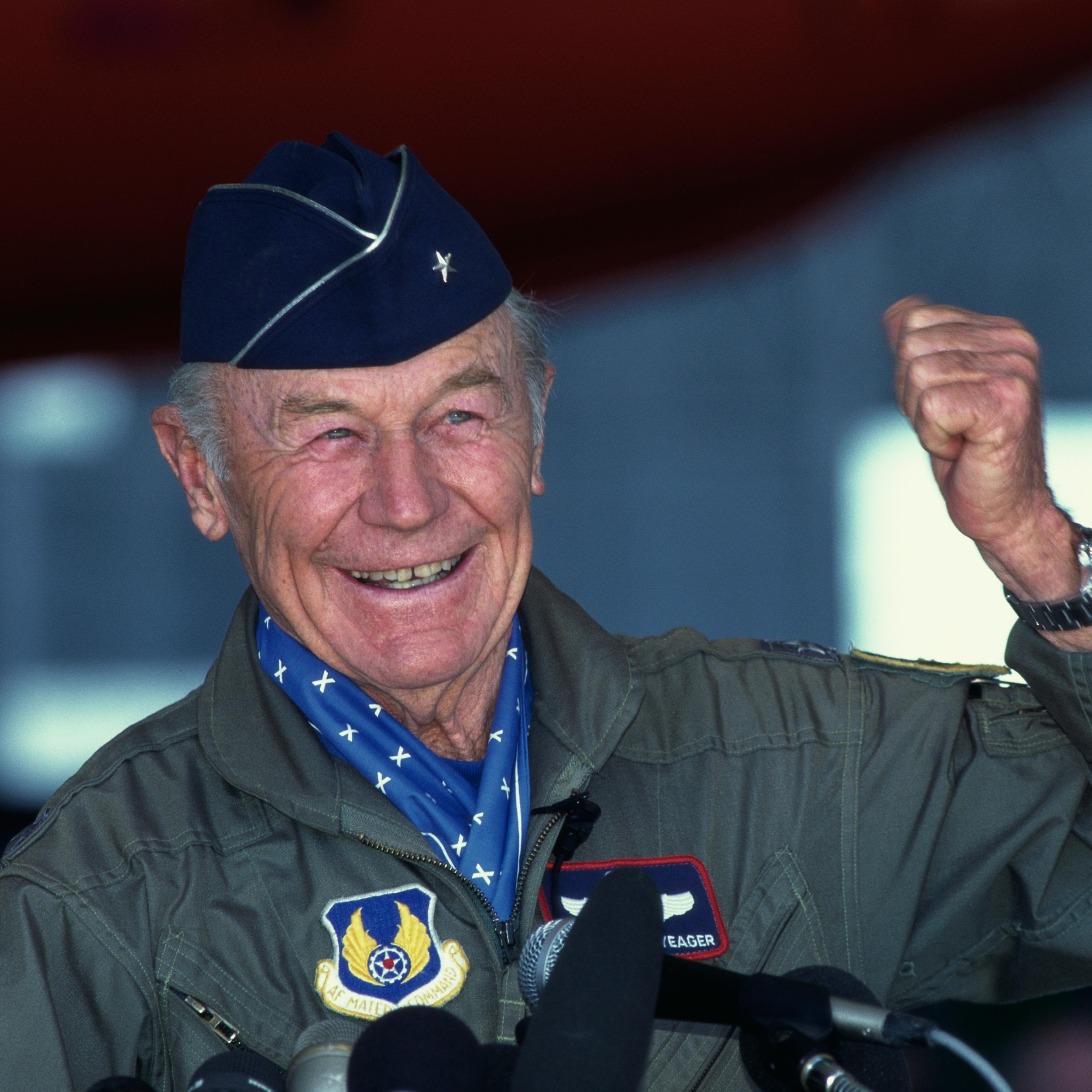 Chuck Yeager Raising Fist at Press Conference