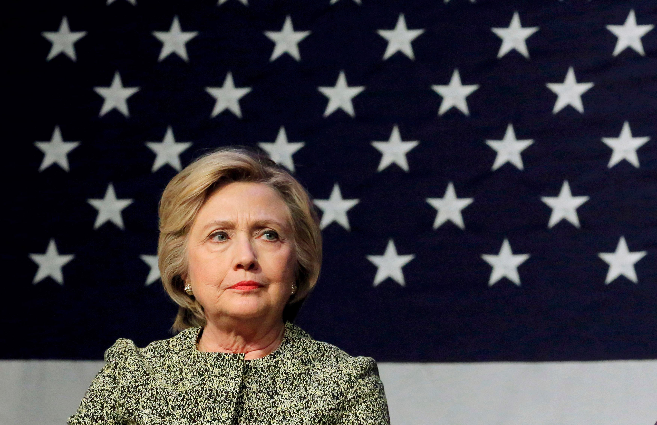 Democratic U.S. presidential candidate Hillary Clinton (C) takes part in a gun control panel with (L-R) Rita Kestenbaum, Marie Delus, Erica Smegielski, Natasha Christopher, Sandy Phillips, and Representative Steve Israel (D-NY) in Port Washington, New Yo