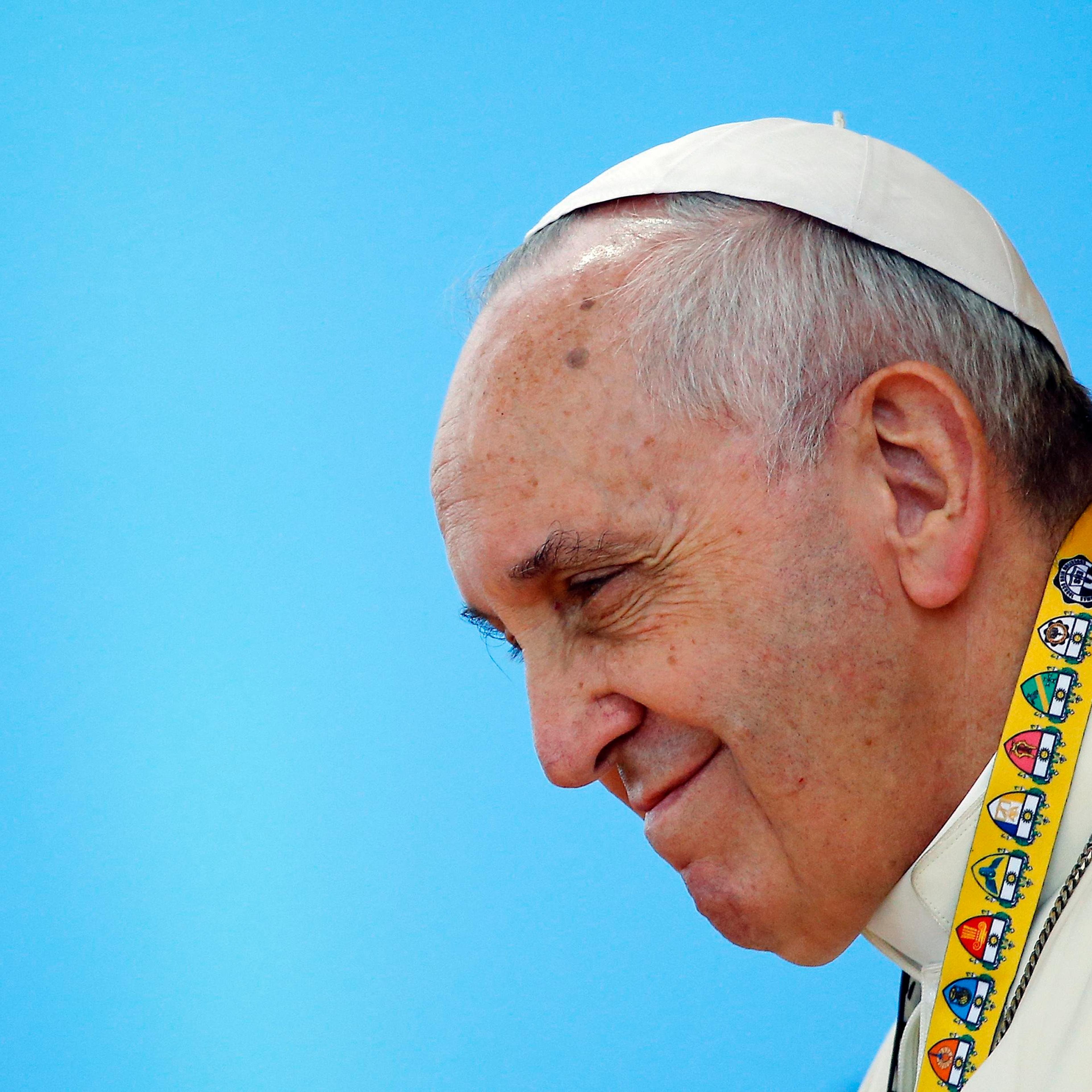 Pope Francis smiles during a meeting with young people at Manila university