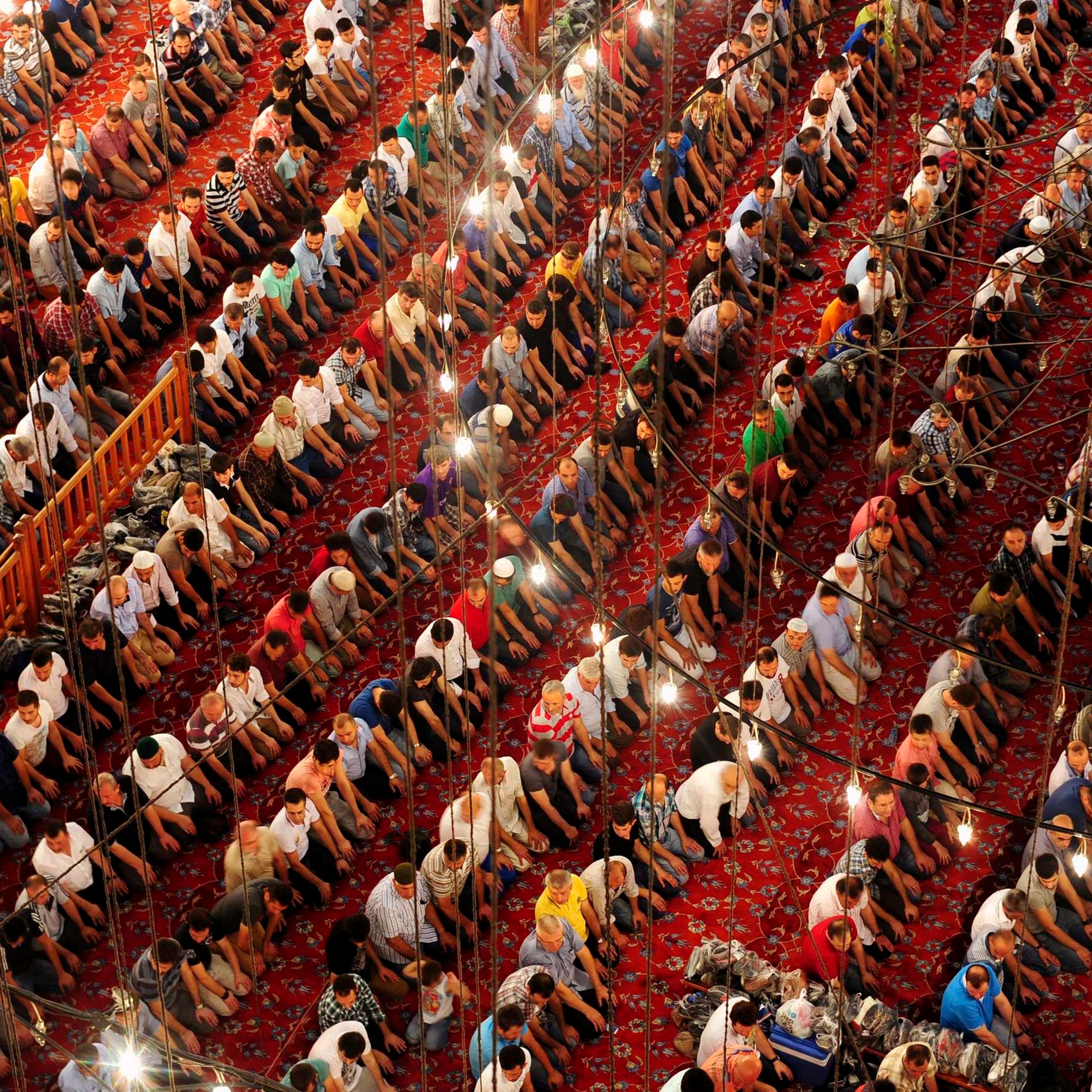 Turkish faithful pray in Ottoman-era Sultanahmet mosque, known as Blue mosque, on "Laylat Al Qadr" during the holy month of Ramadan, in Istanbul late July 23, 2014.