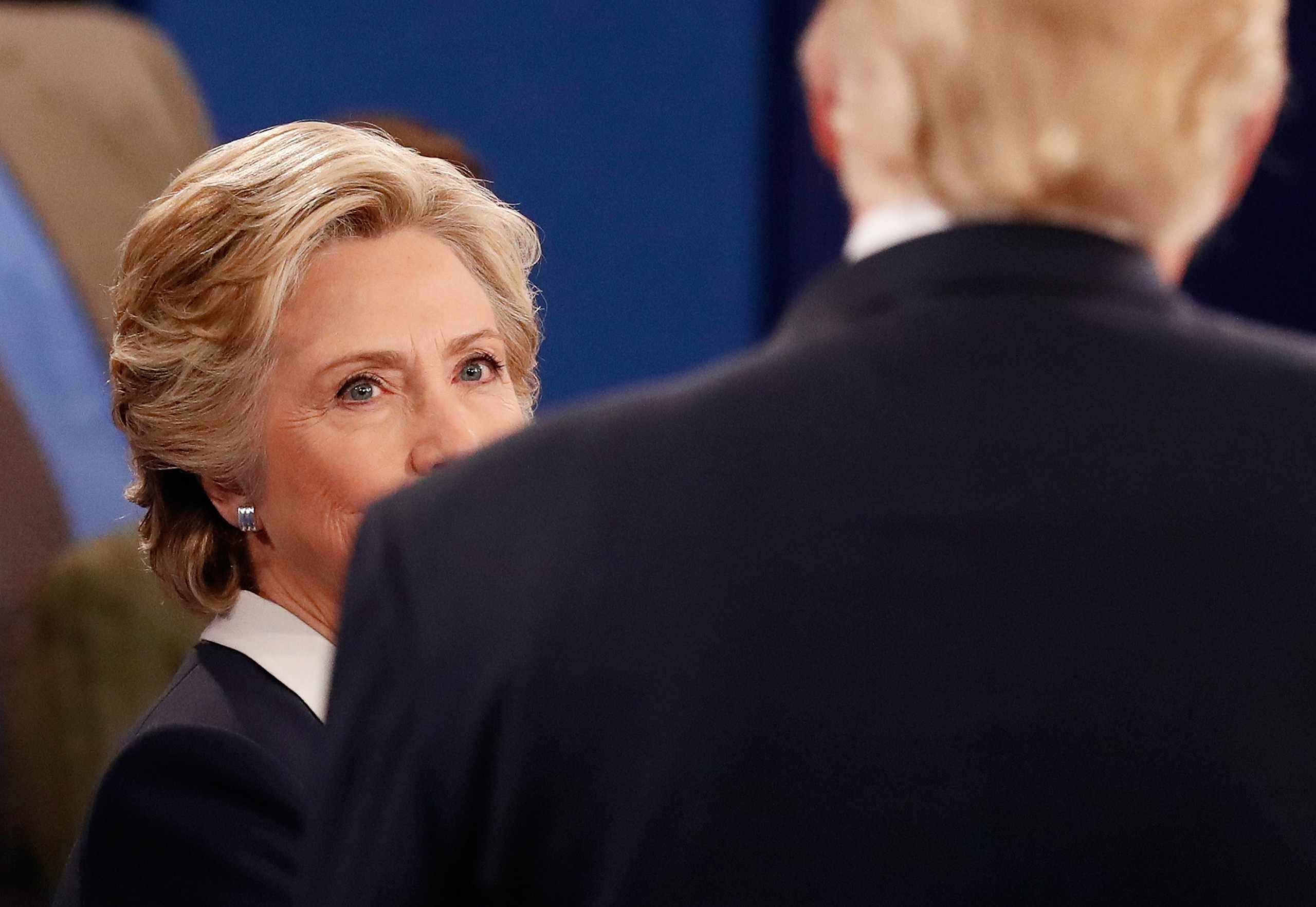 Hillary Clinton and Donald Trump attend the town hall debate at Washington University in St Louis, Missouri, on Oct. 9, 2016.