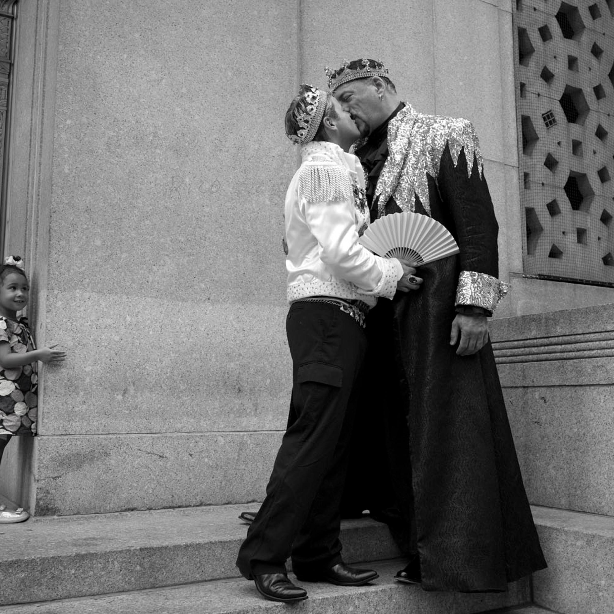 Damian Ross (left) and Gary Cosgrove embrace on the steps of the Manhattan City Clerk's office while waiting in line on July 24, 2011.